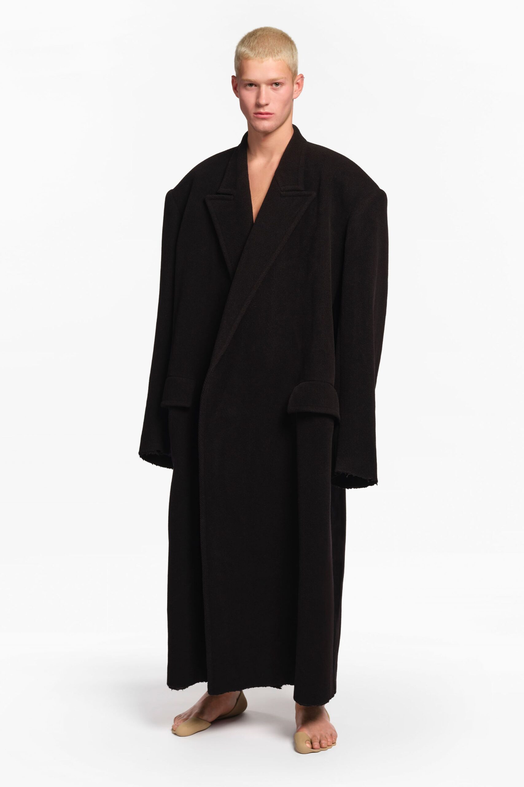black wool long-sleeve collared oversized structured pockets coat