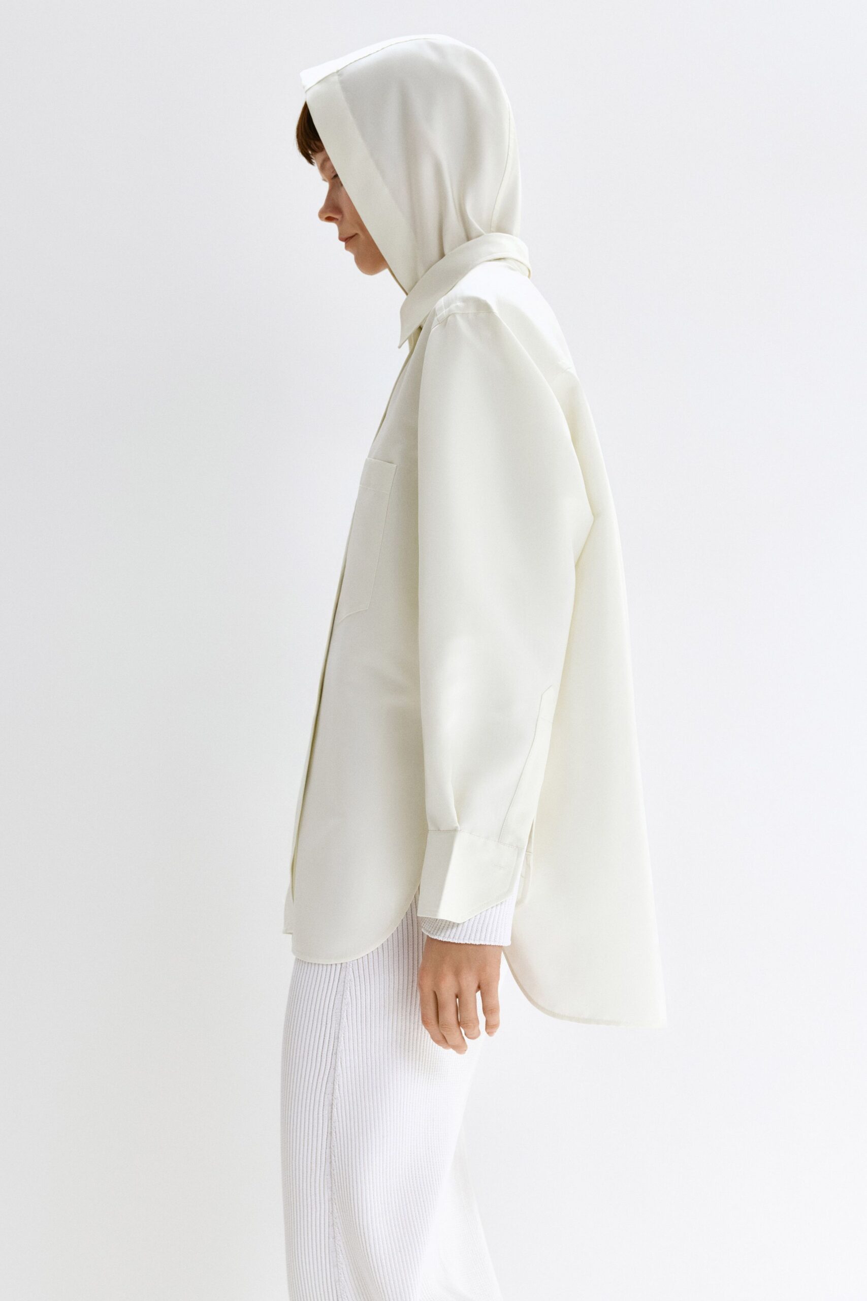 white hooded shirt with fitted pants