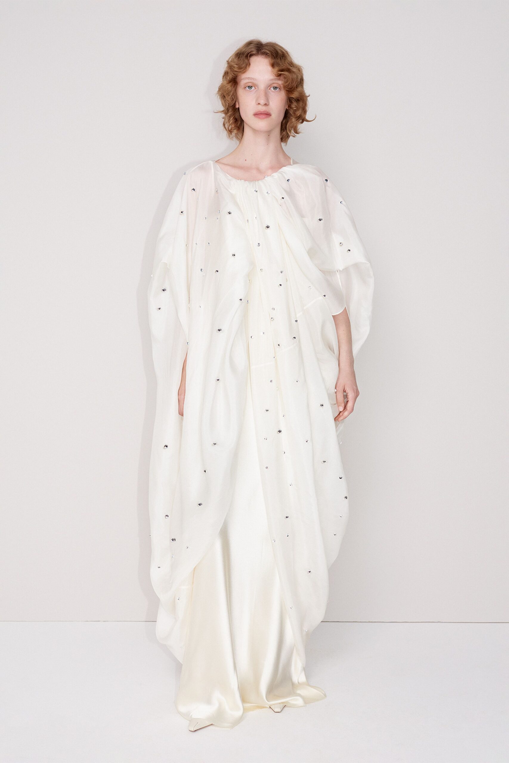 white silk oversized draped embellished flowing cape