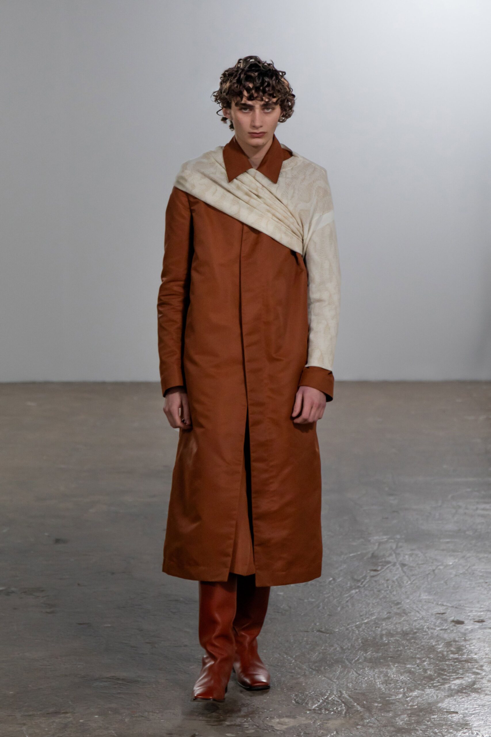 brown coat with red shoes