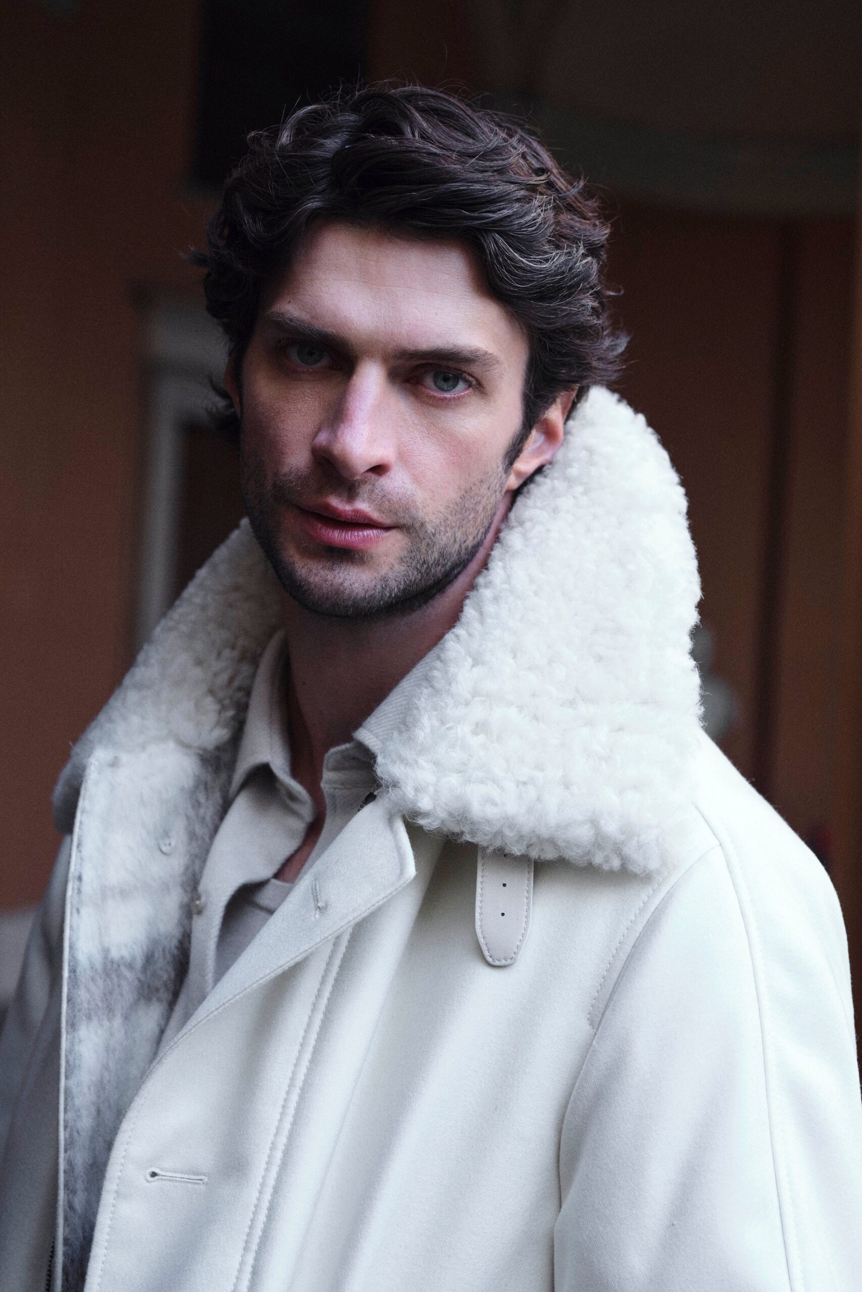 white leather long-sleeve collared fitted zippered jacket