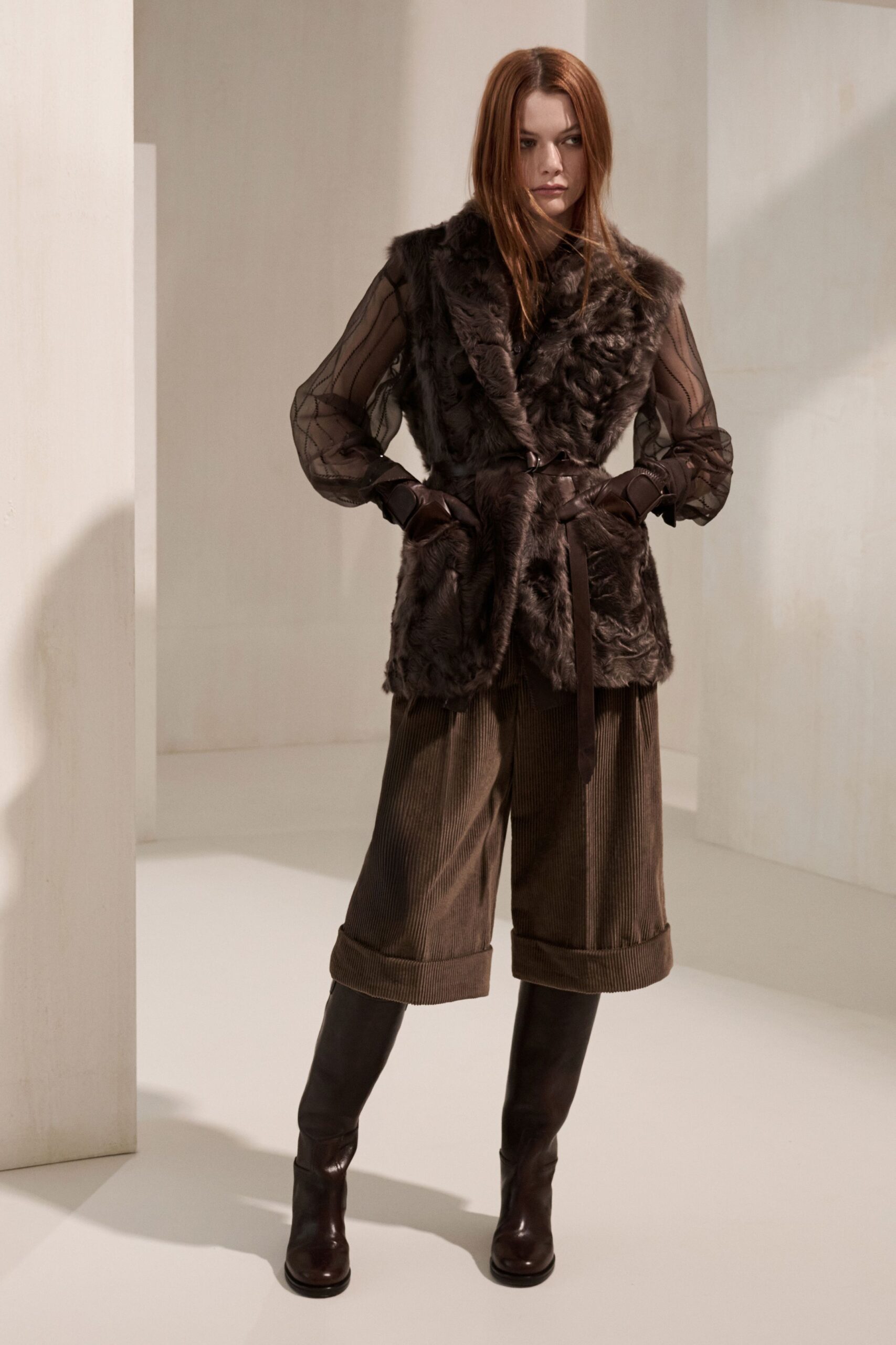brown fur sleeveless collared fitted ruffled belted vest