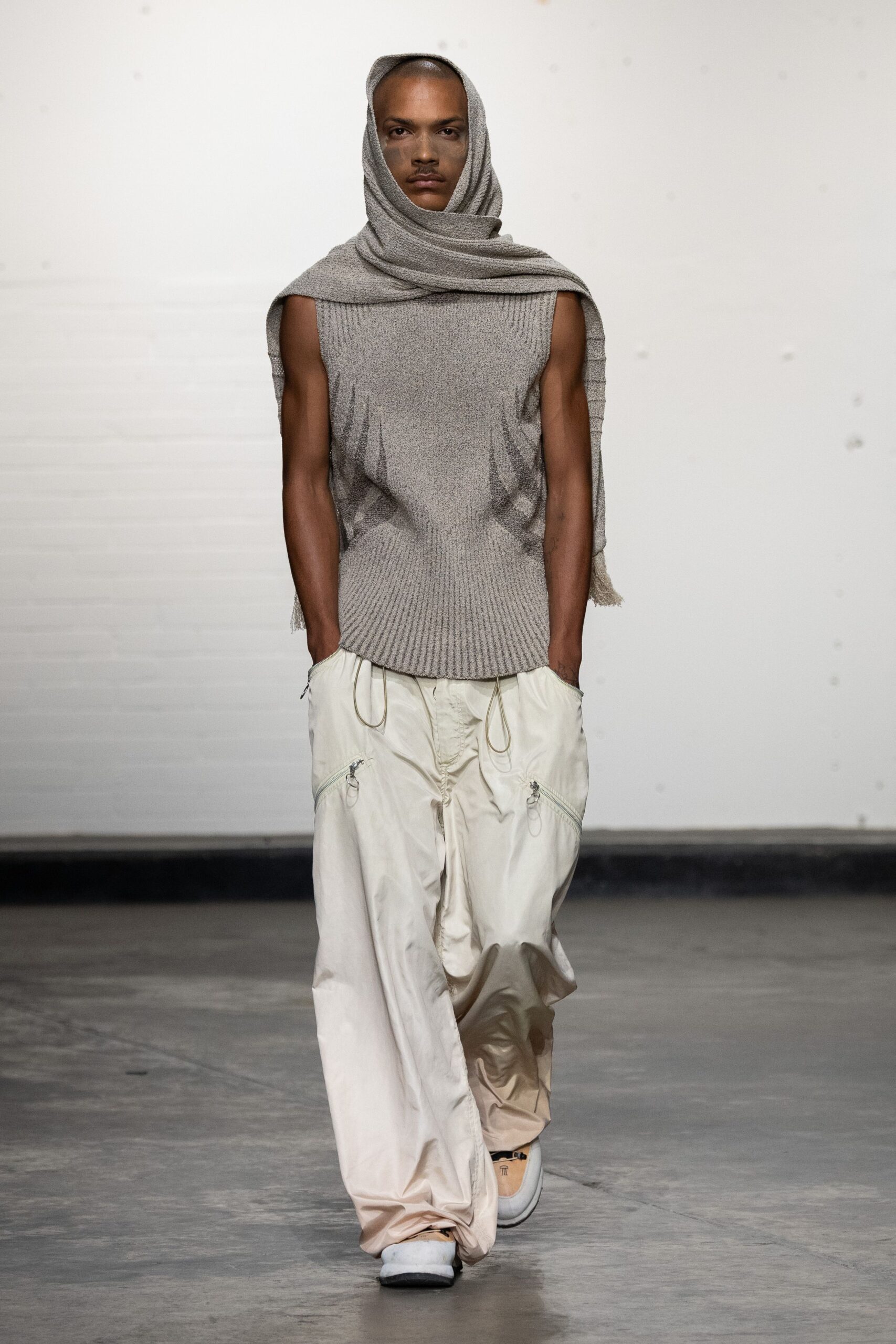 beige knit sleeveless high-neck fitted layered top