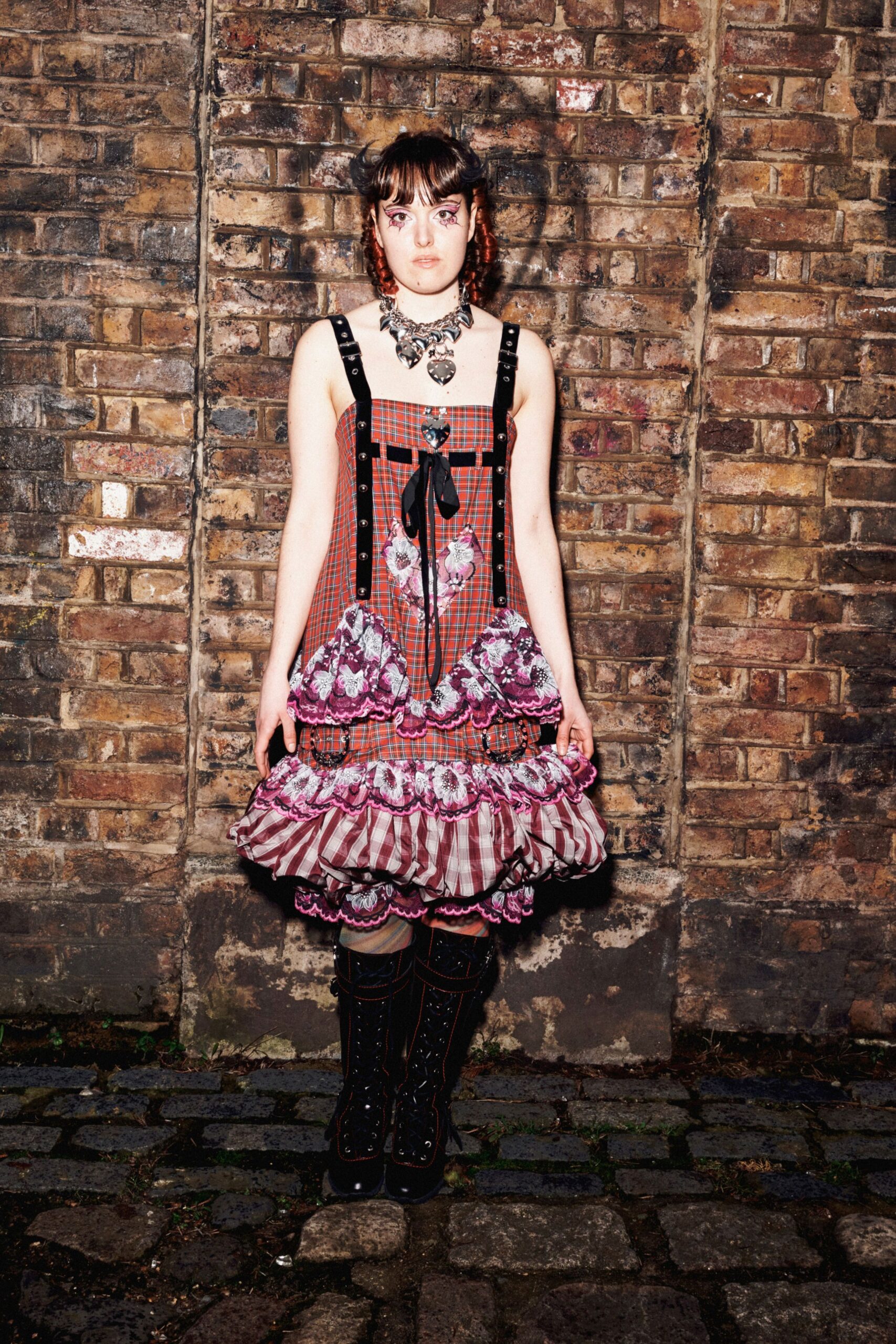 black leather fitted embroidered boots