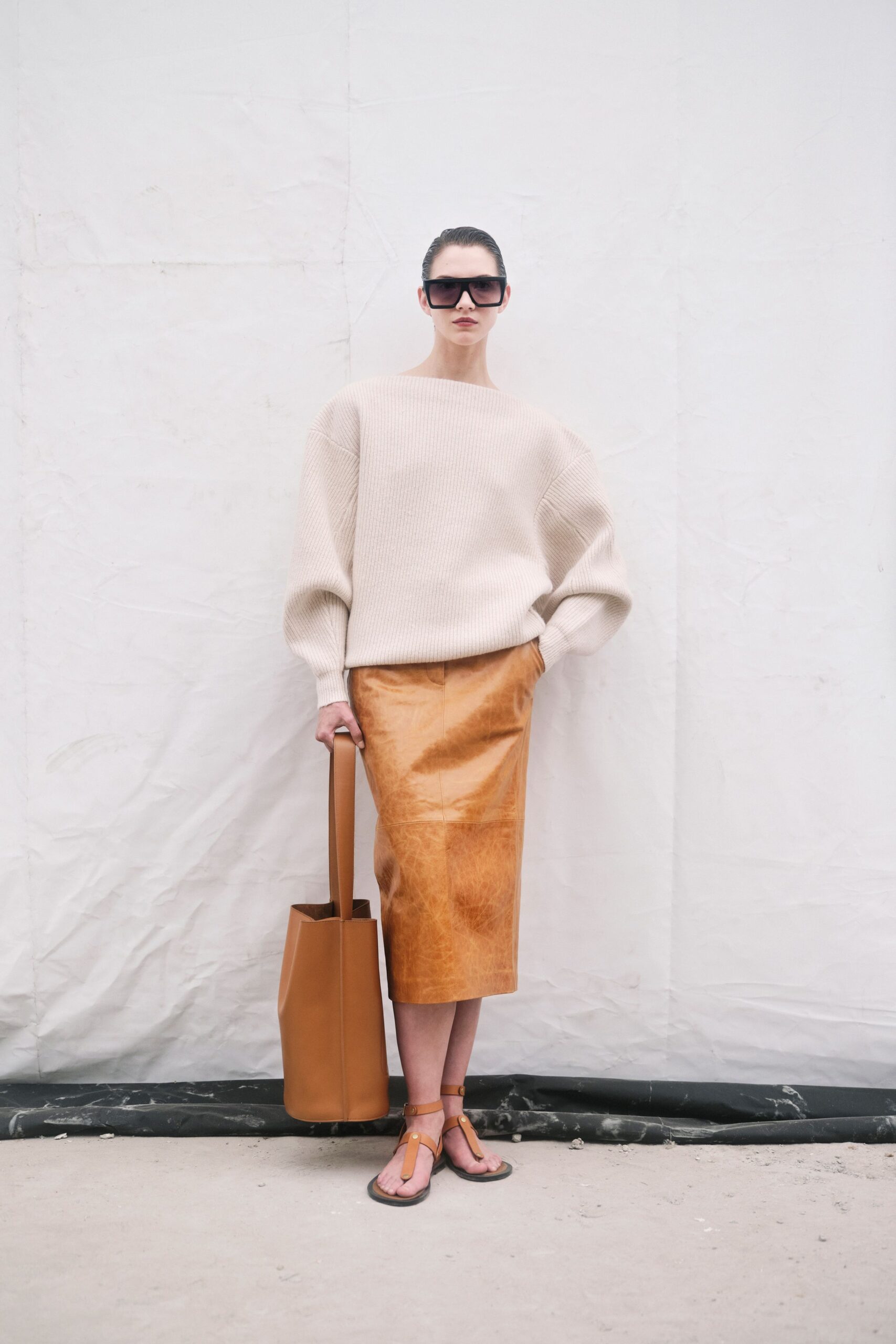 beige oversized sweater with brown pencil skirt