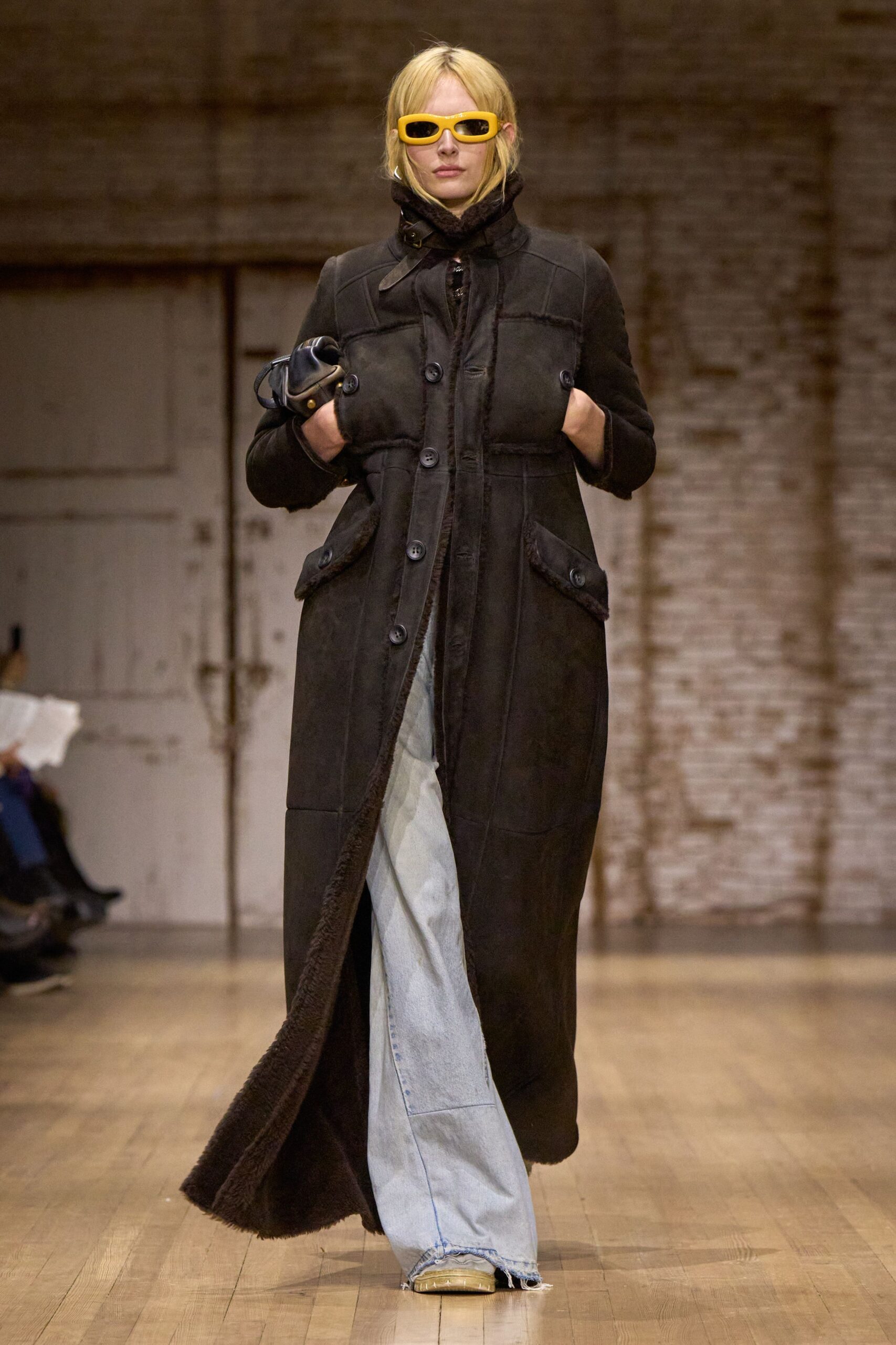black leather long-sleeve collared fitted buttoned pockets coat