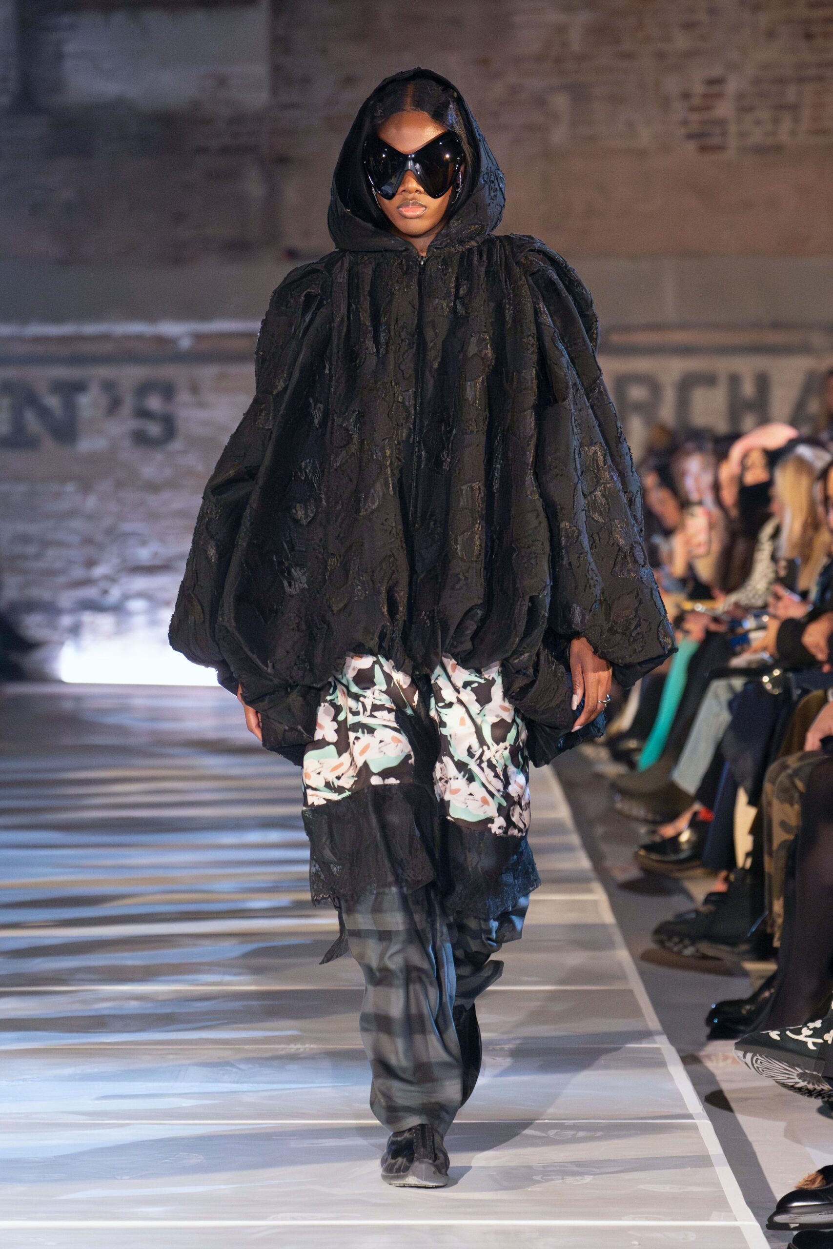 black embroidered cape with floral top