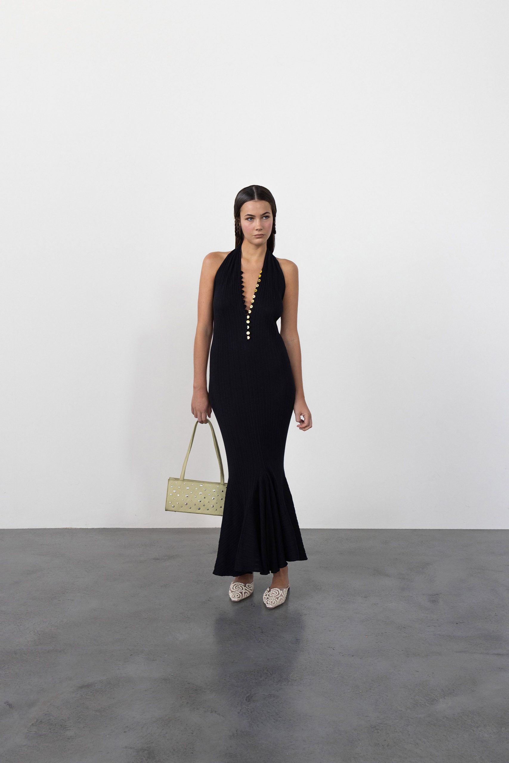 black fitted sleeveless gown