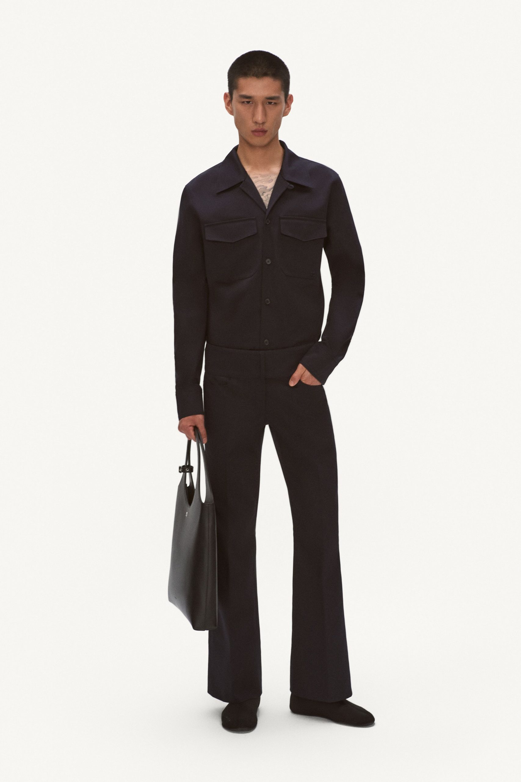 black fitted jacket and pants
