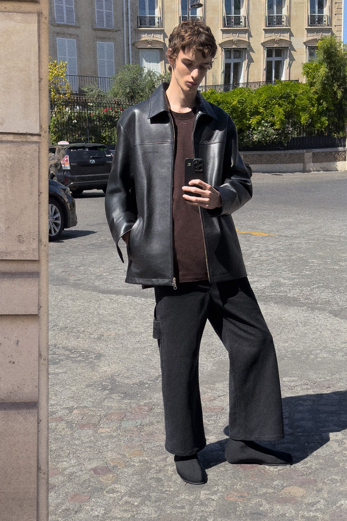 black leather jacket with brown t-shirt
