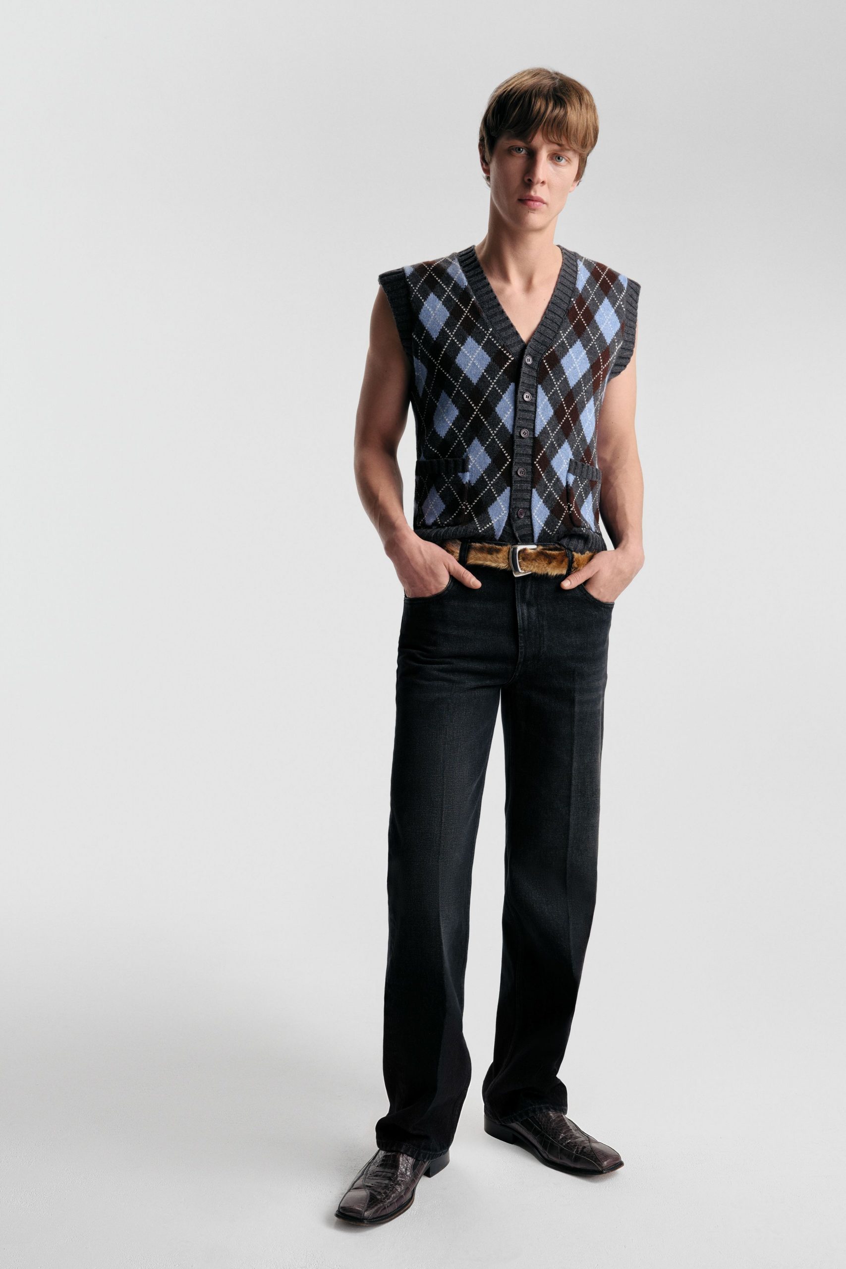 blue checked vest with black jeans