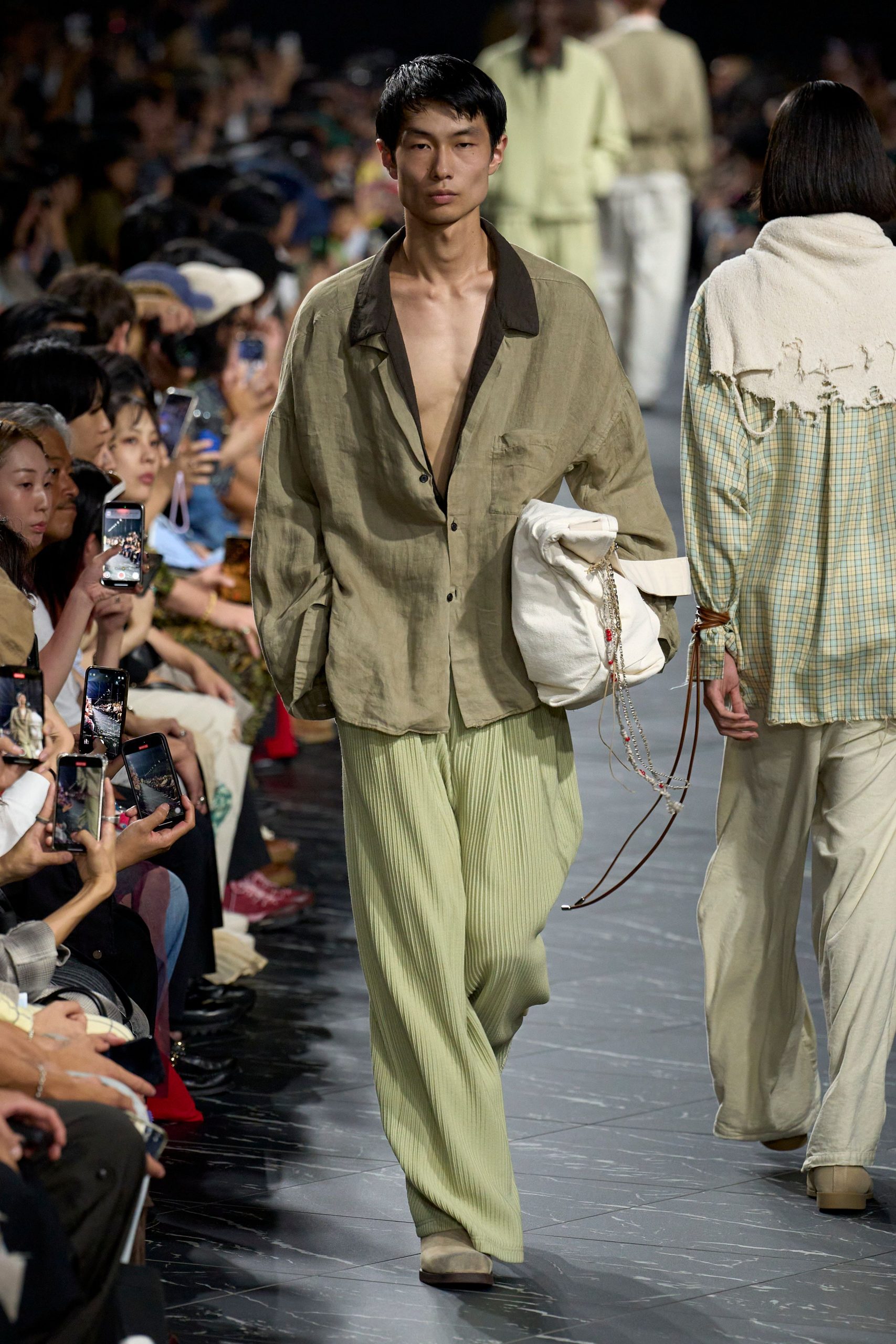 beige linen shirt with green pants