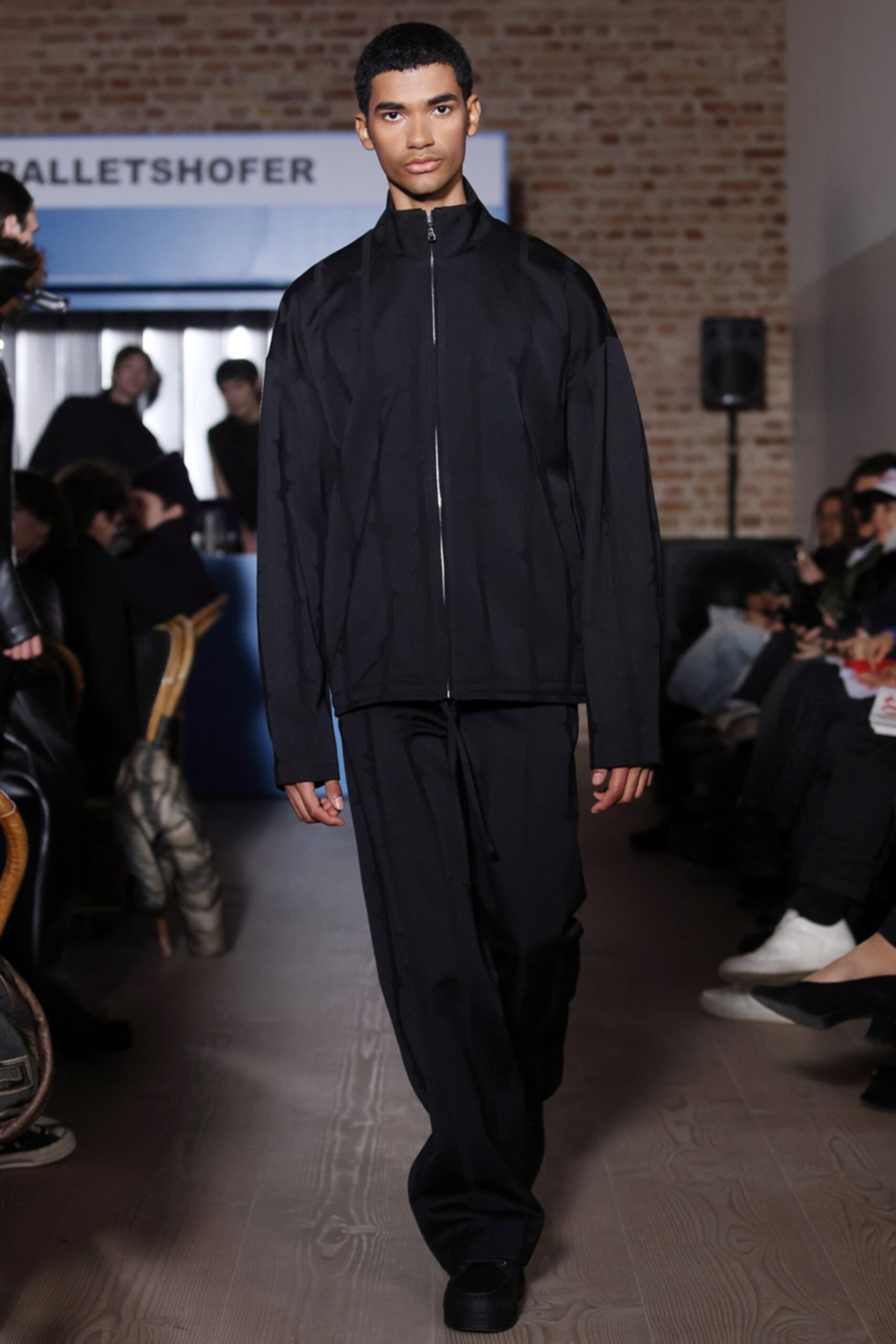 black oversized jacket and pants