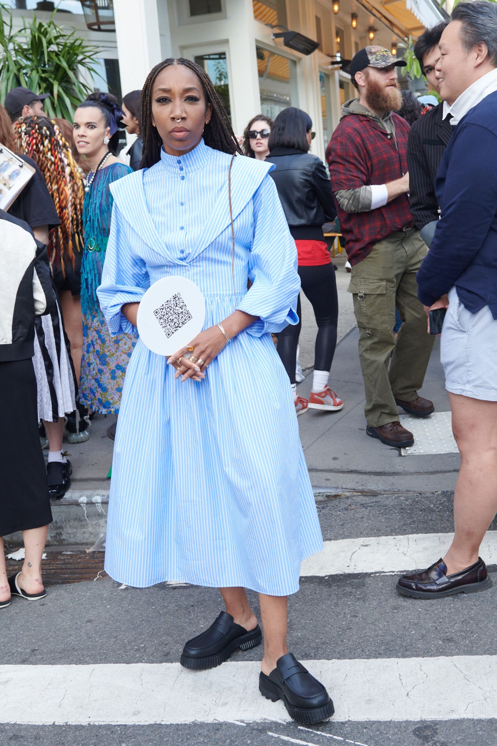 blue and white striped shirt-dress with black shoes