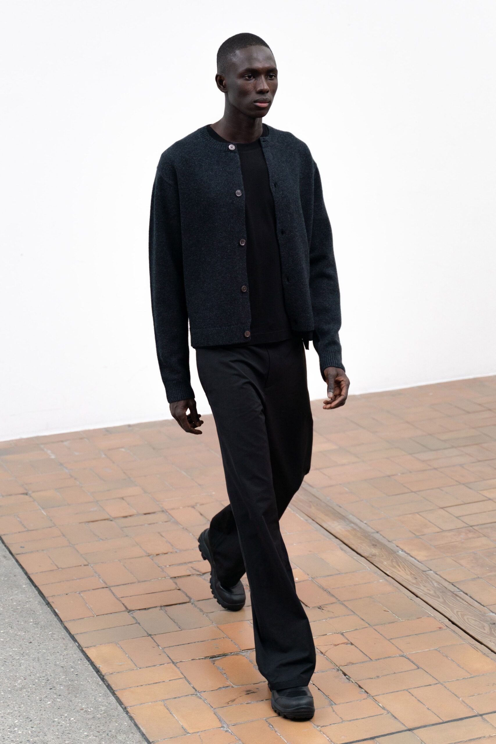 black wool cardigan with t-shirt and pants