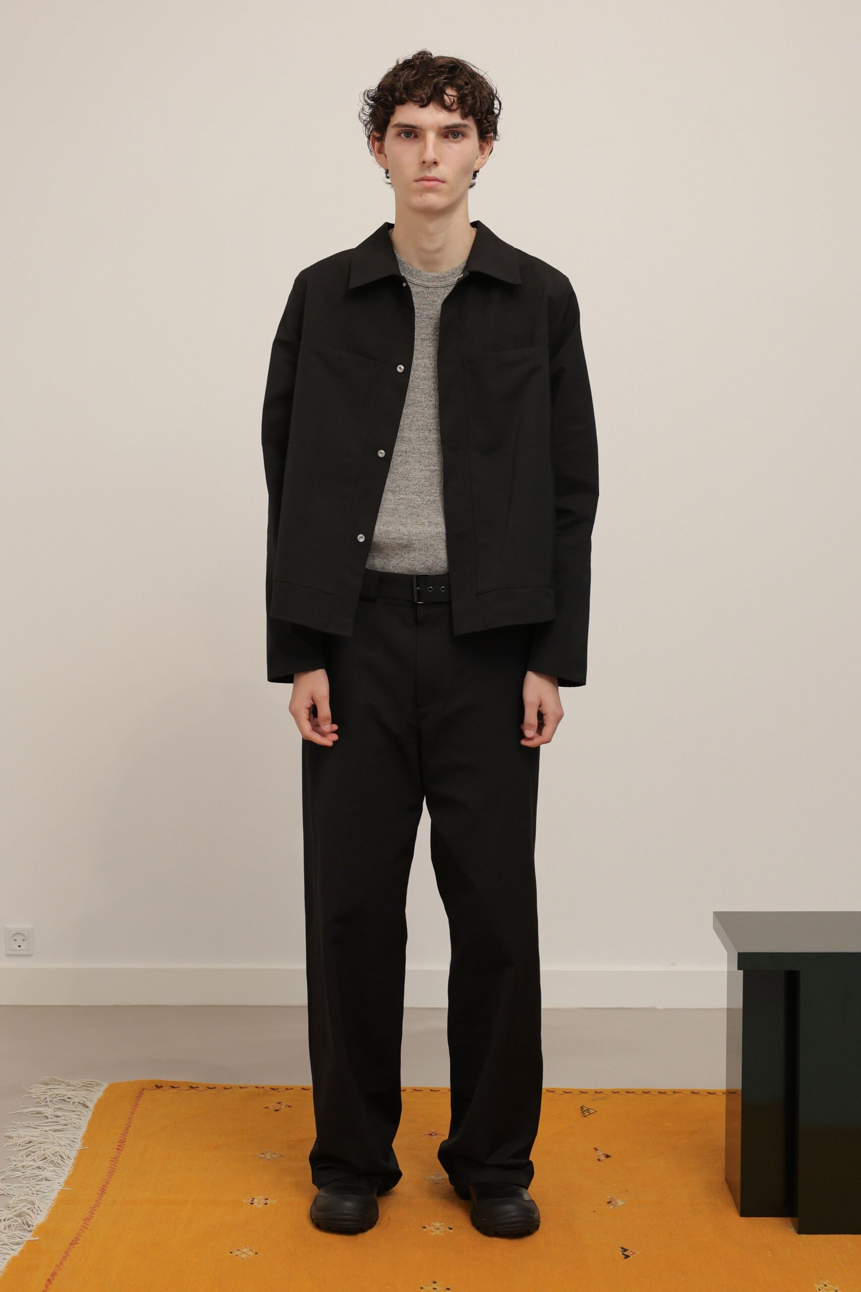 black cotton long-sleeve collared oversized buttoned jacket