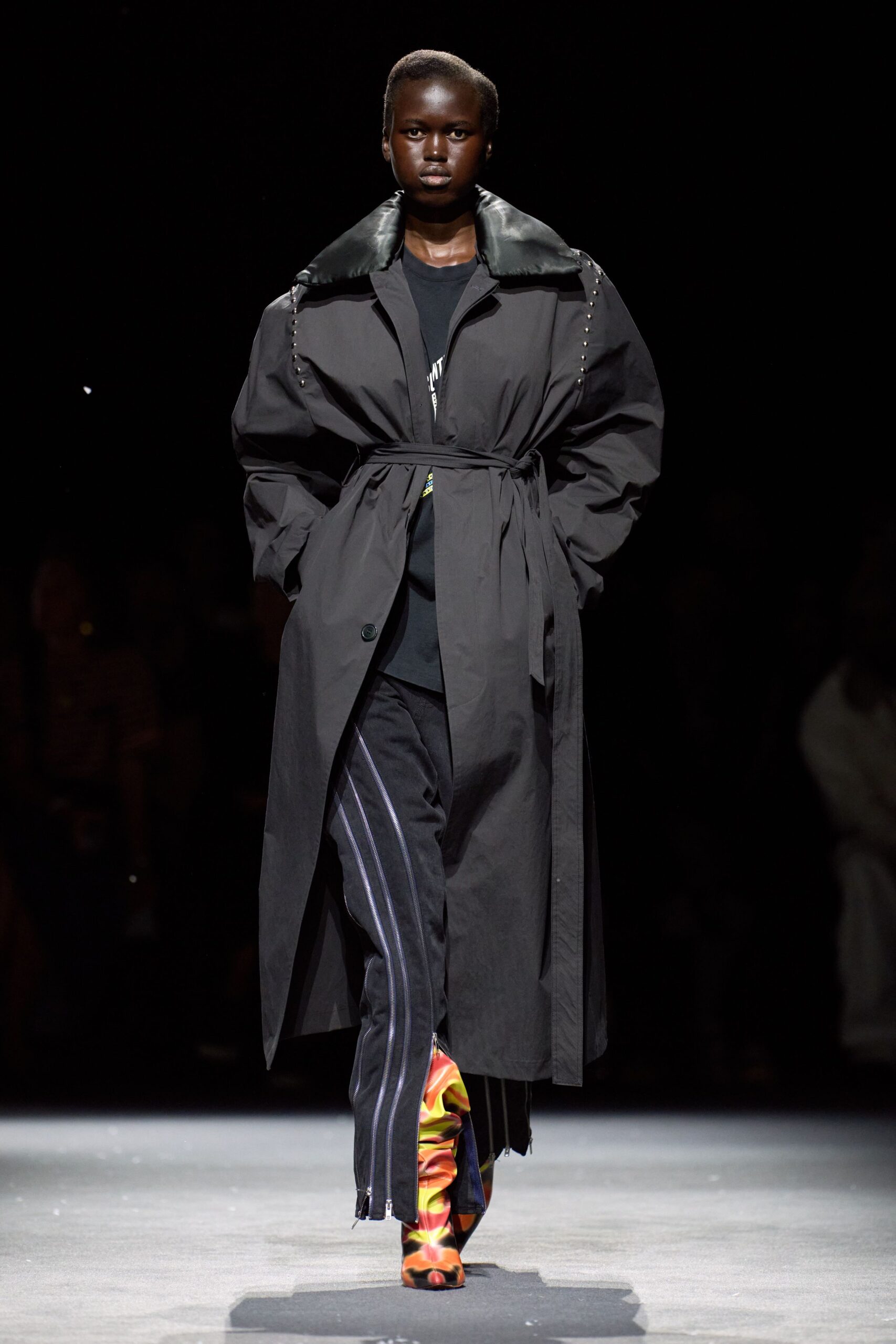 black coat with striped pants