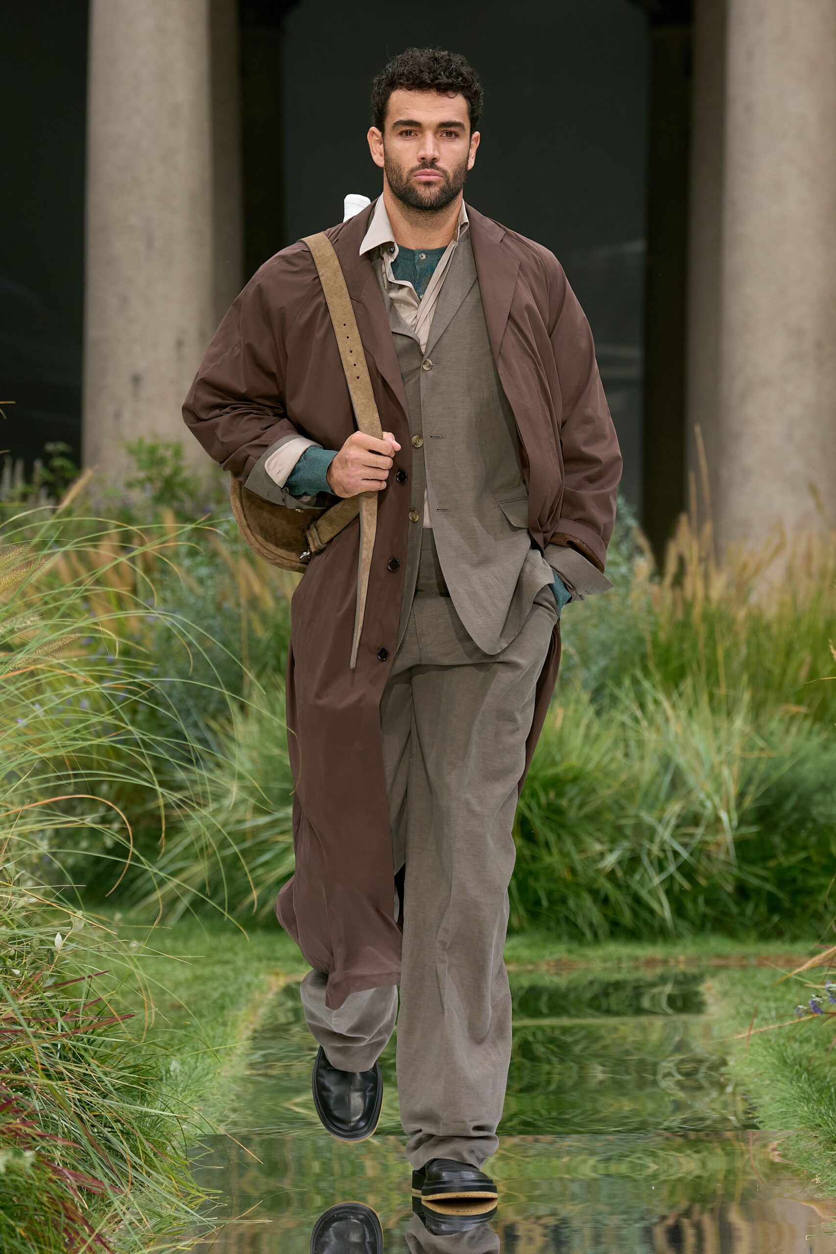 brown coat gray suit black shoes