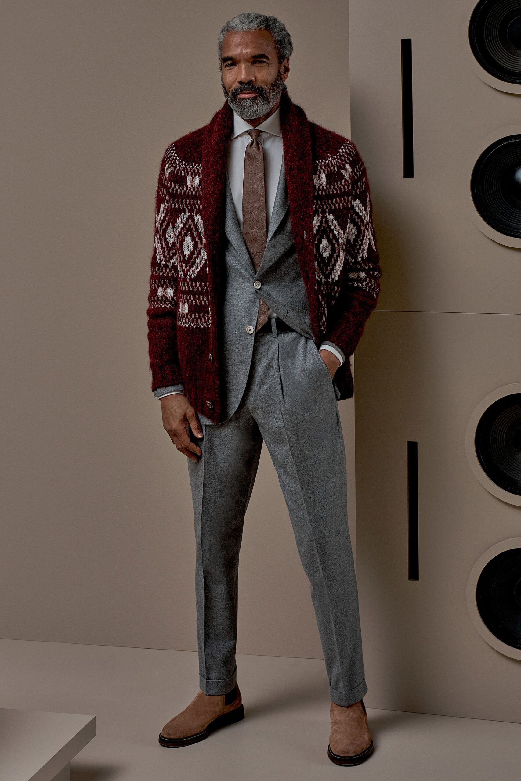 gray tailored suit with red sweater
