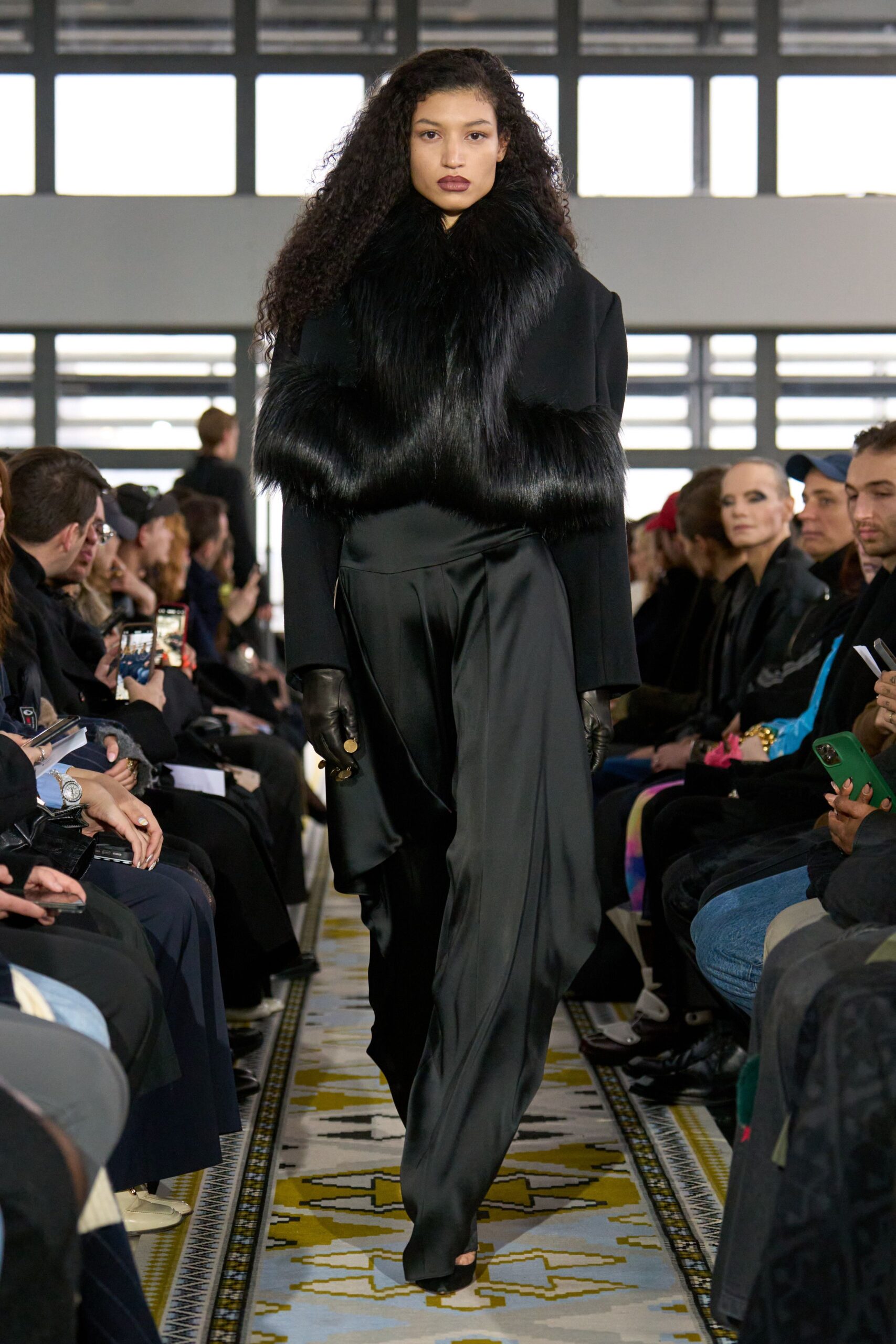 black fur coat with silk pants