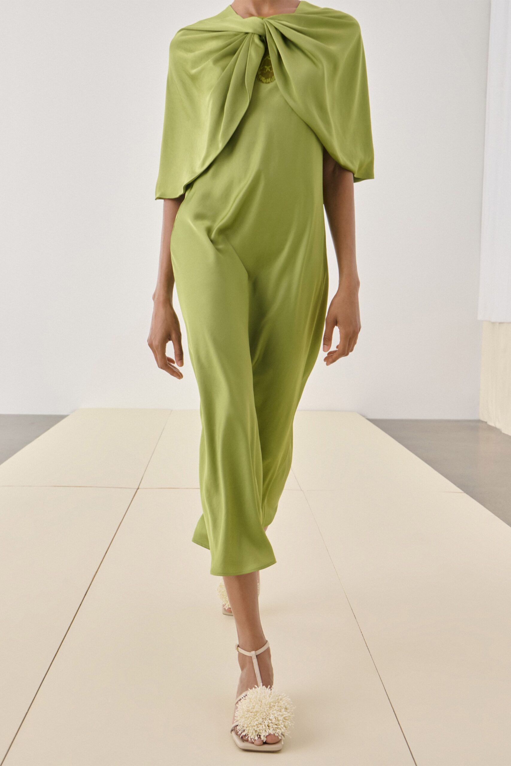 green silk sleeveless high-neck relaxed draped midi jumpsuit
