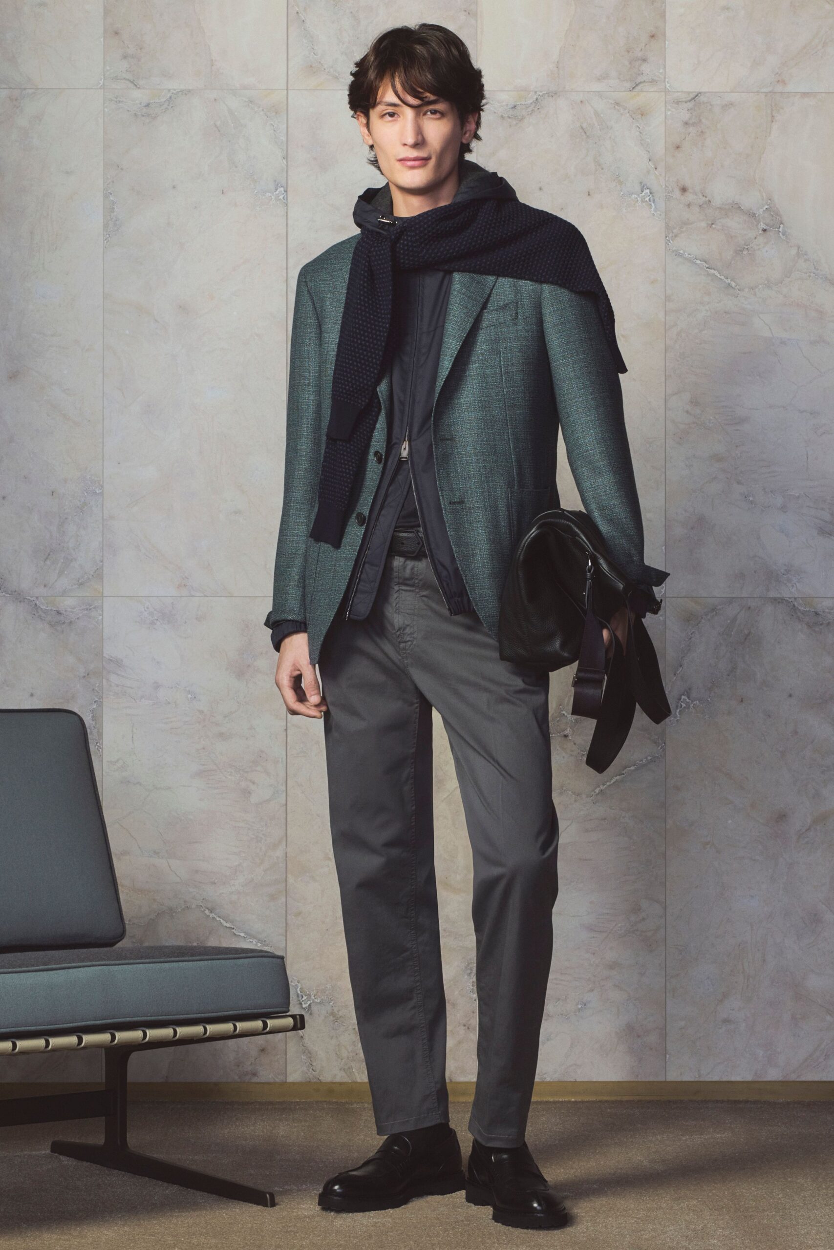 gray tailored blazer with black shirt