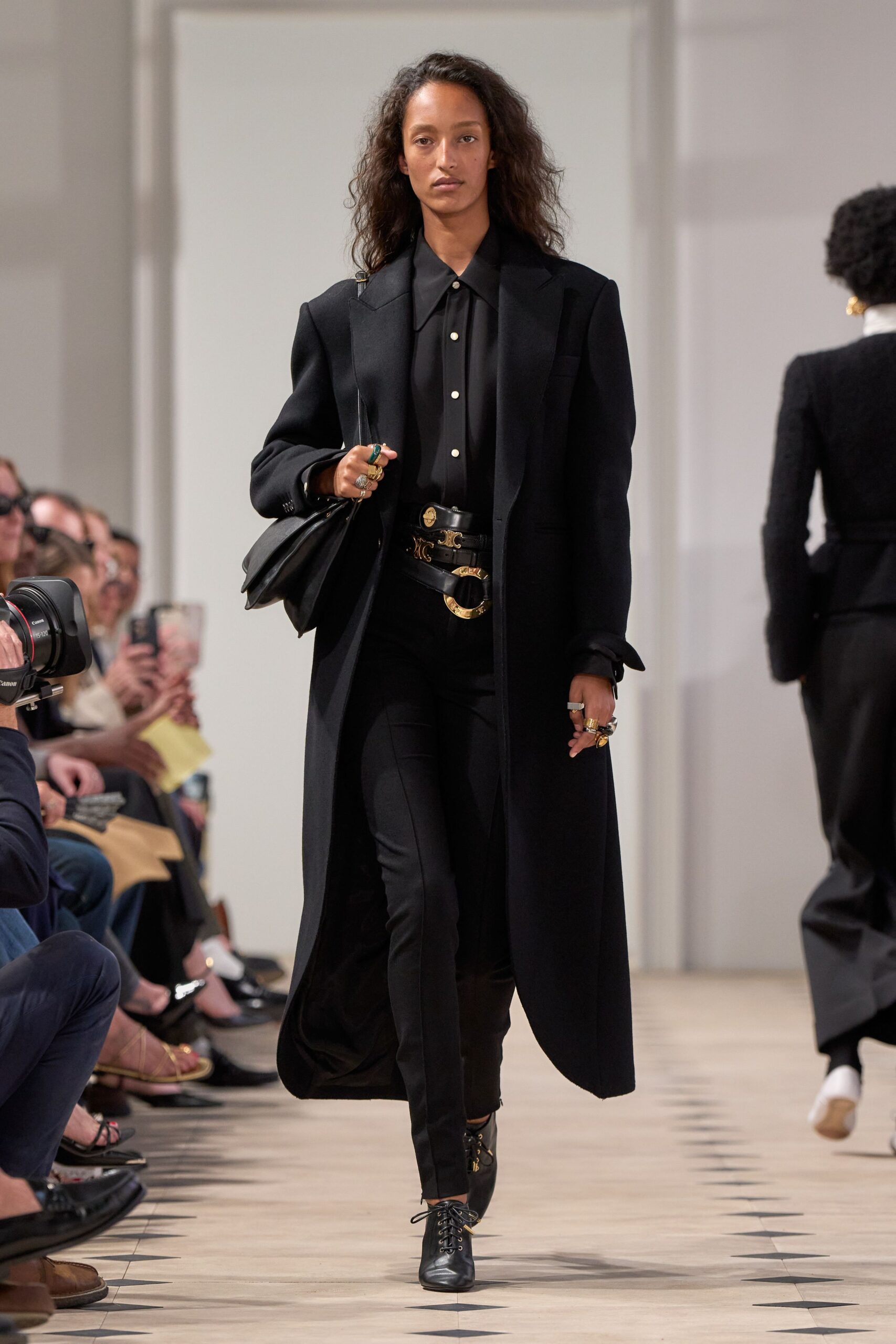 black coat with shirt and boots