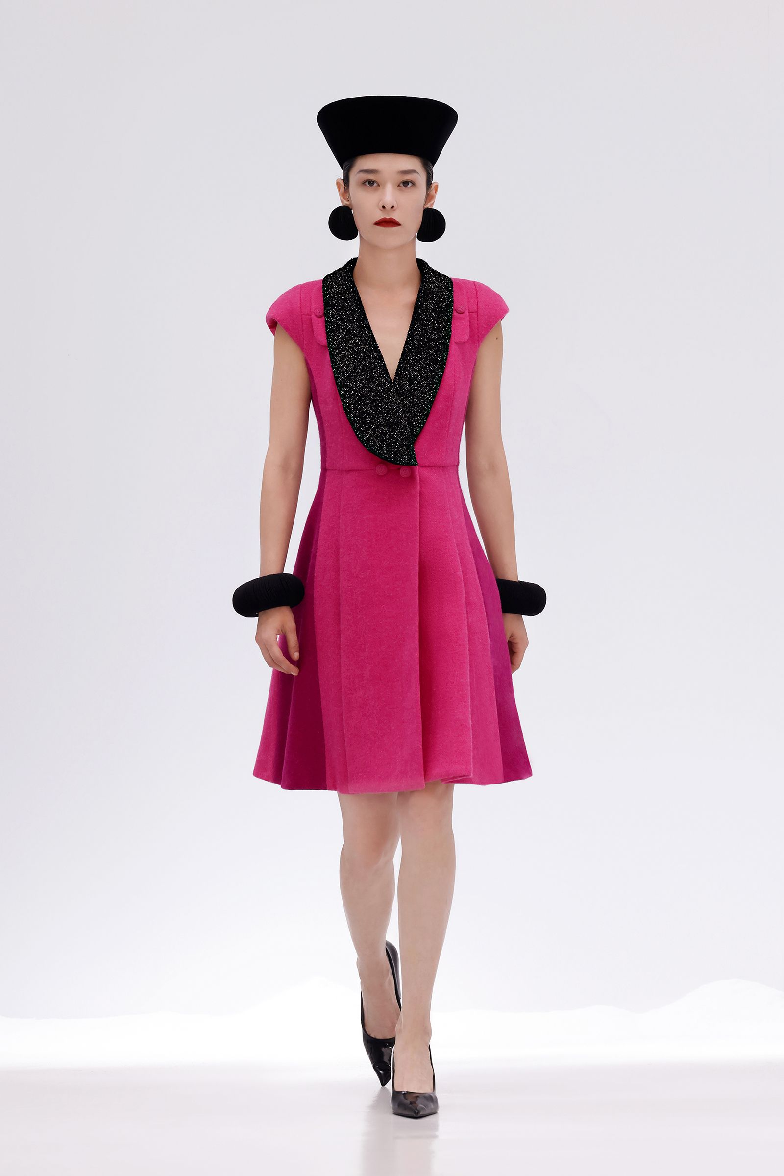 pink mini dress with black accents
