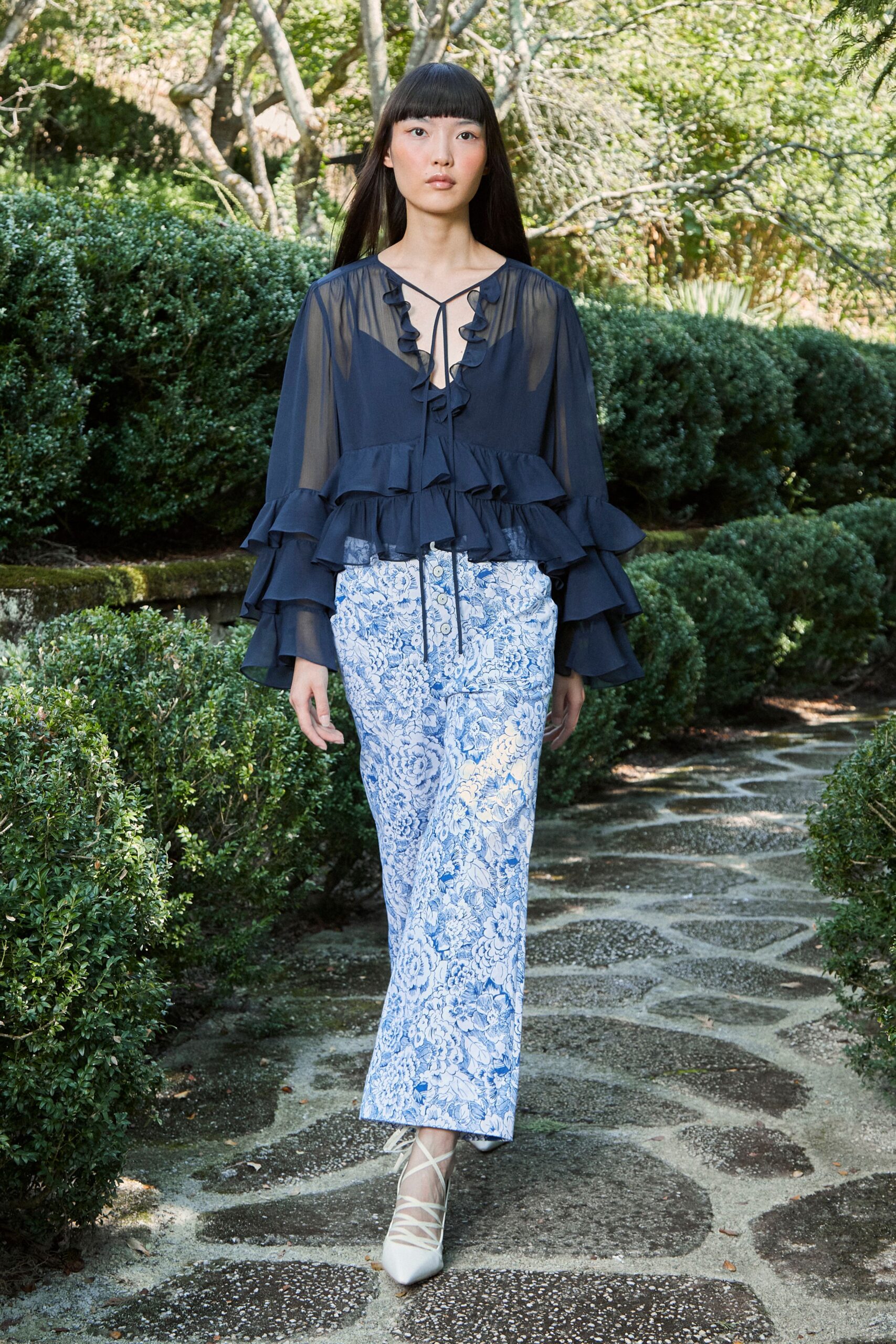 blue silk long-sleeve v-neck fitted ruffled sheer blouse