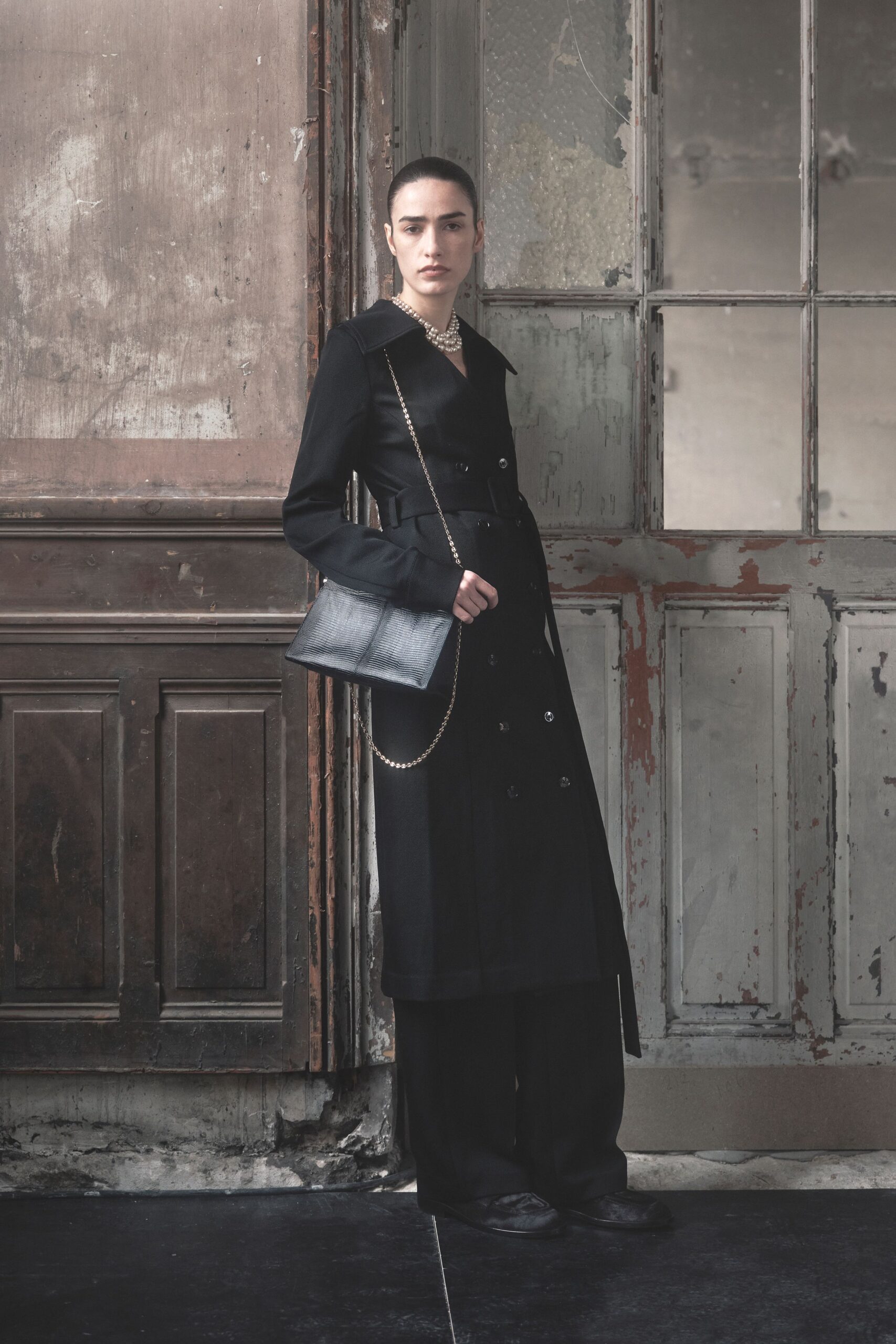 black cotton long-sleeve collared fitted buttoned midi trench