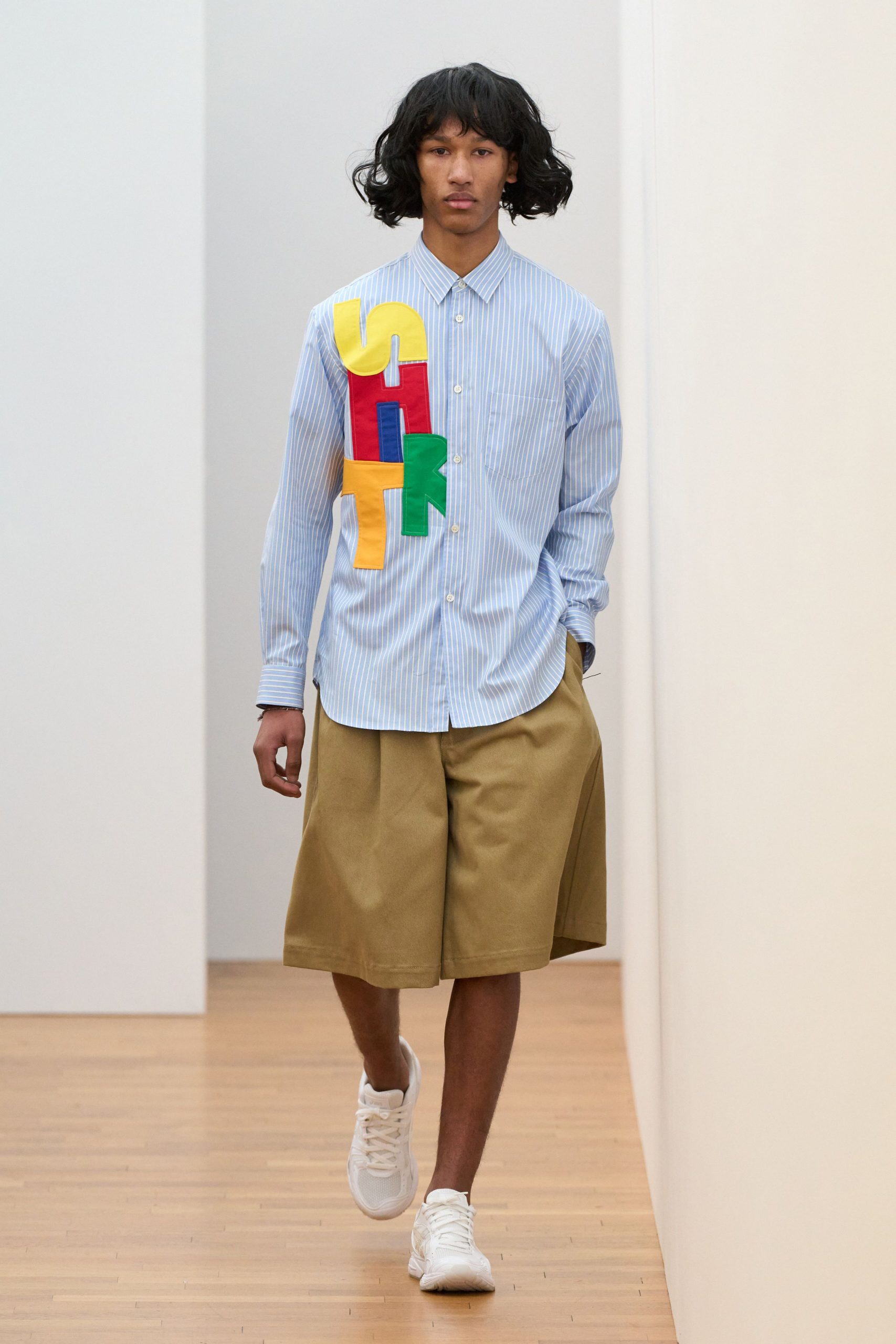 blue striped shirt beige shorts