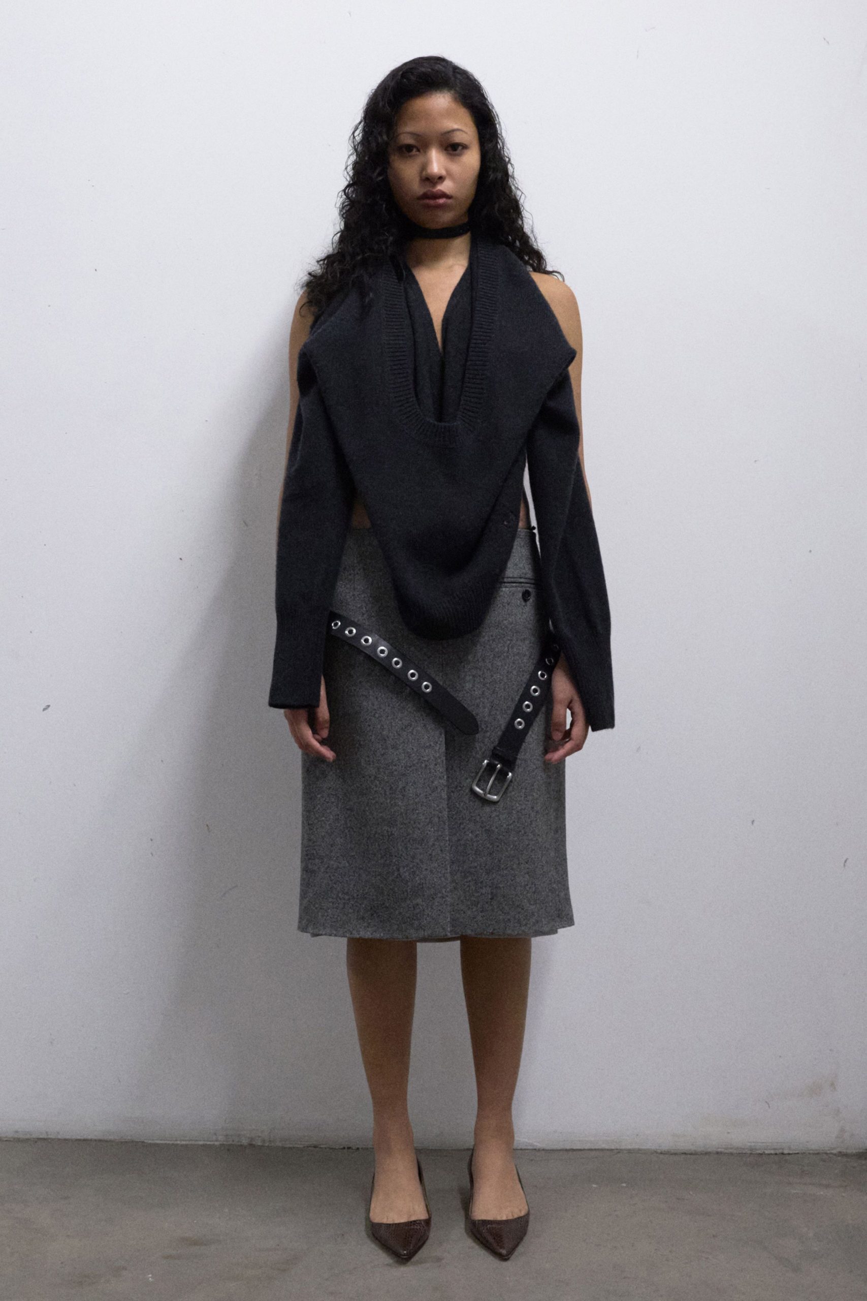 black wool sleeveless v-neck fitted draped top