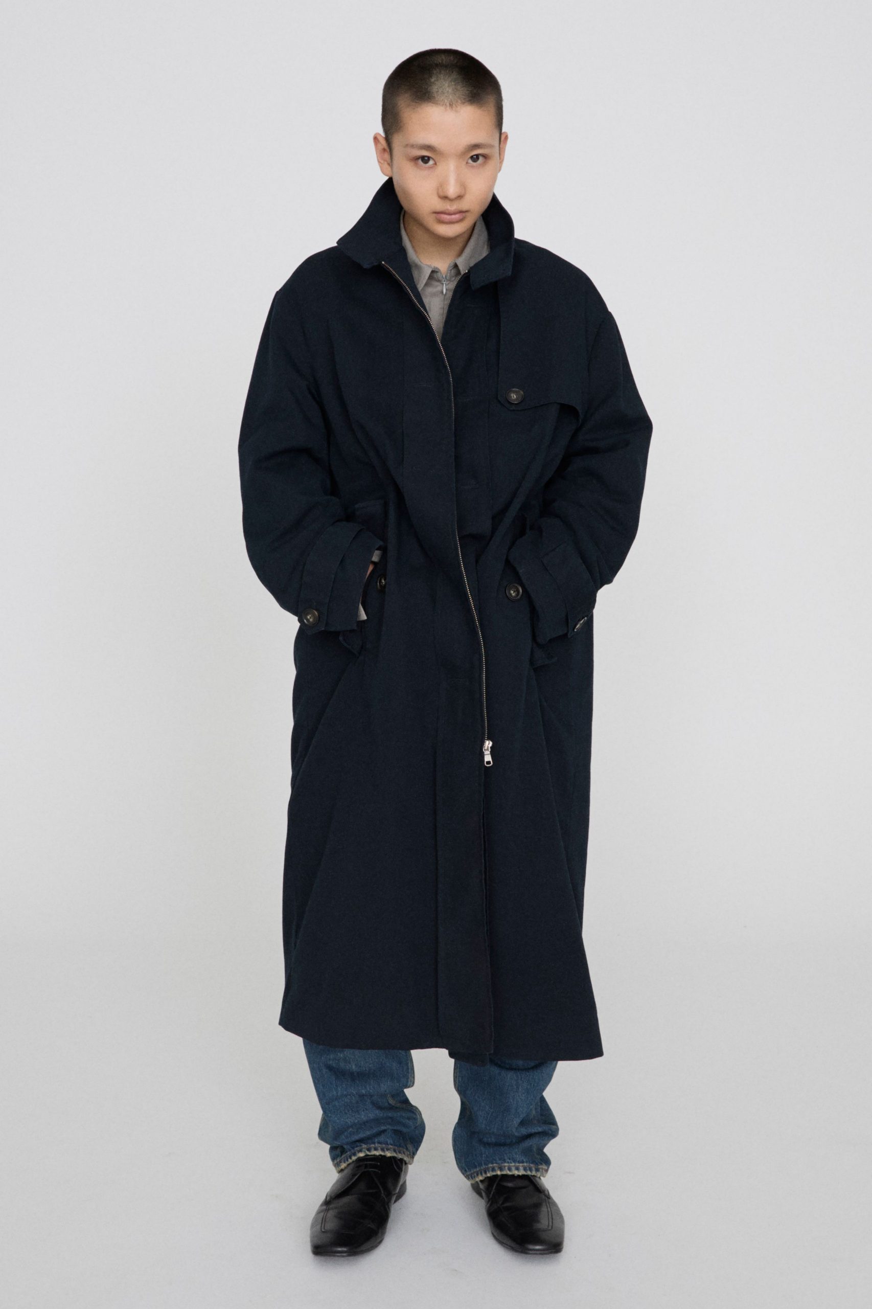 black cotton long-sleeve collared relaxed zippered buttoned coat
