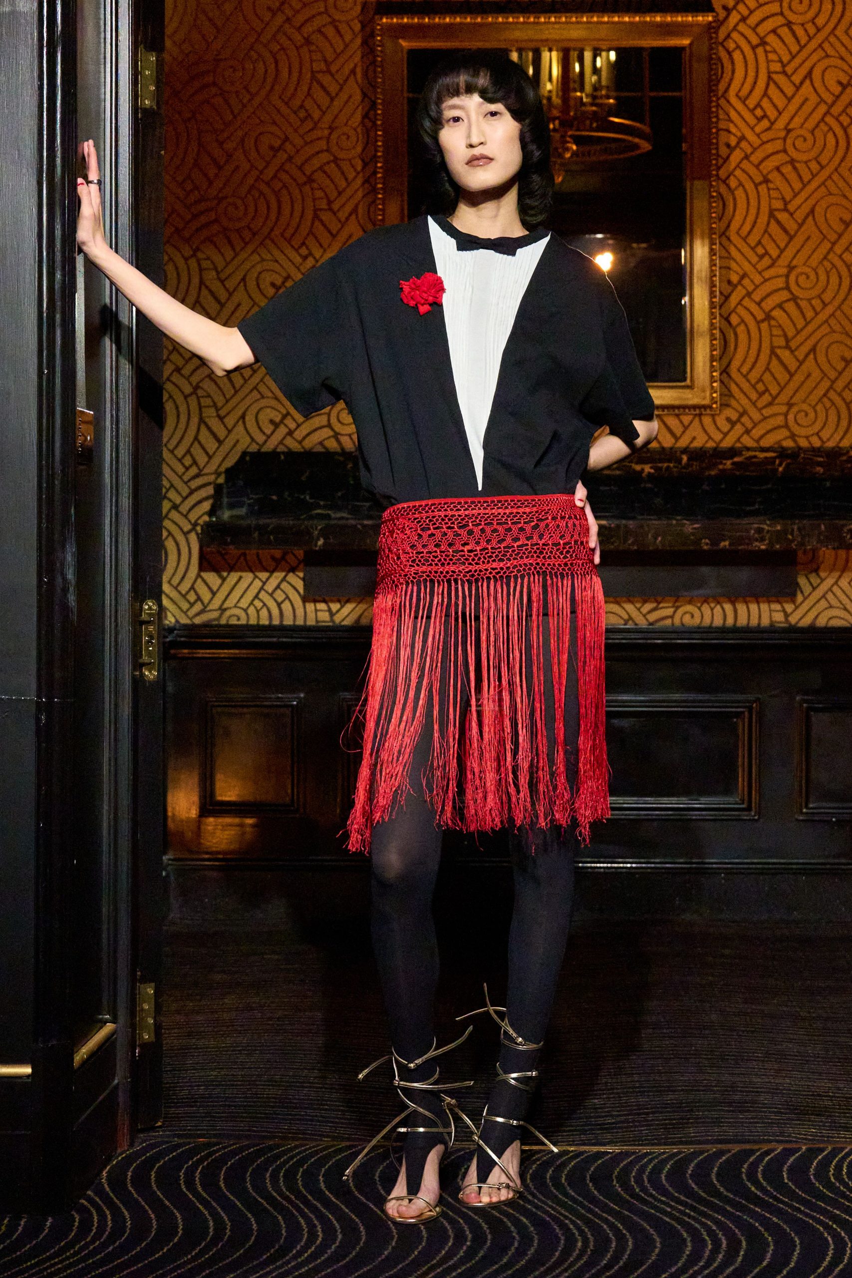 black top red fringed skirt
