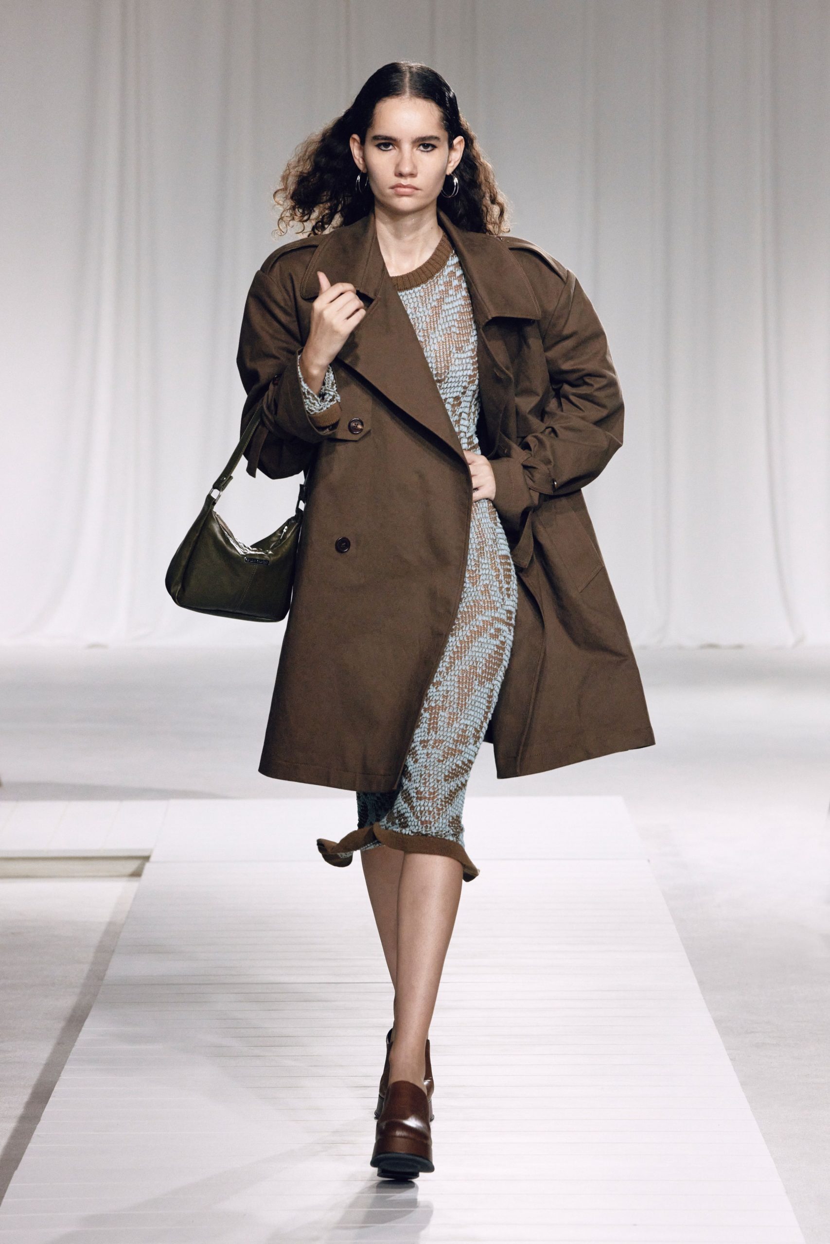 brown coat over blue midi dress