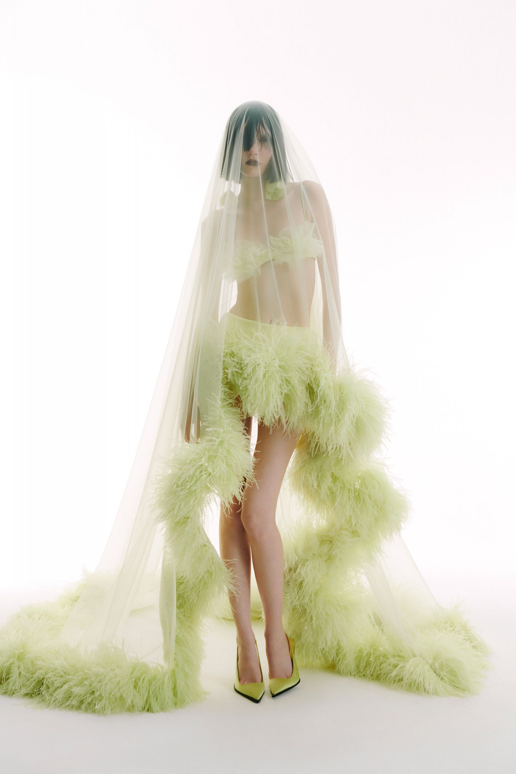 green tulle sleeveless strapless fitted fringed flowing dress