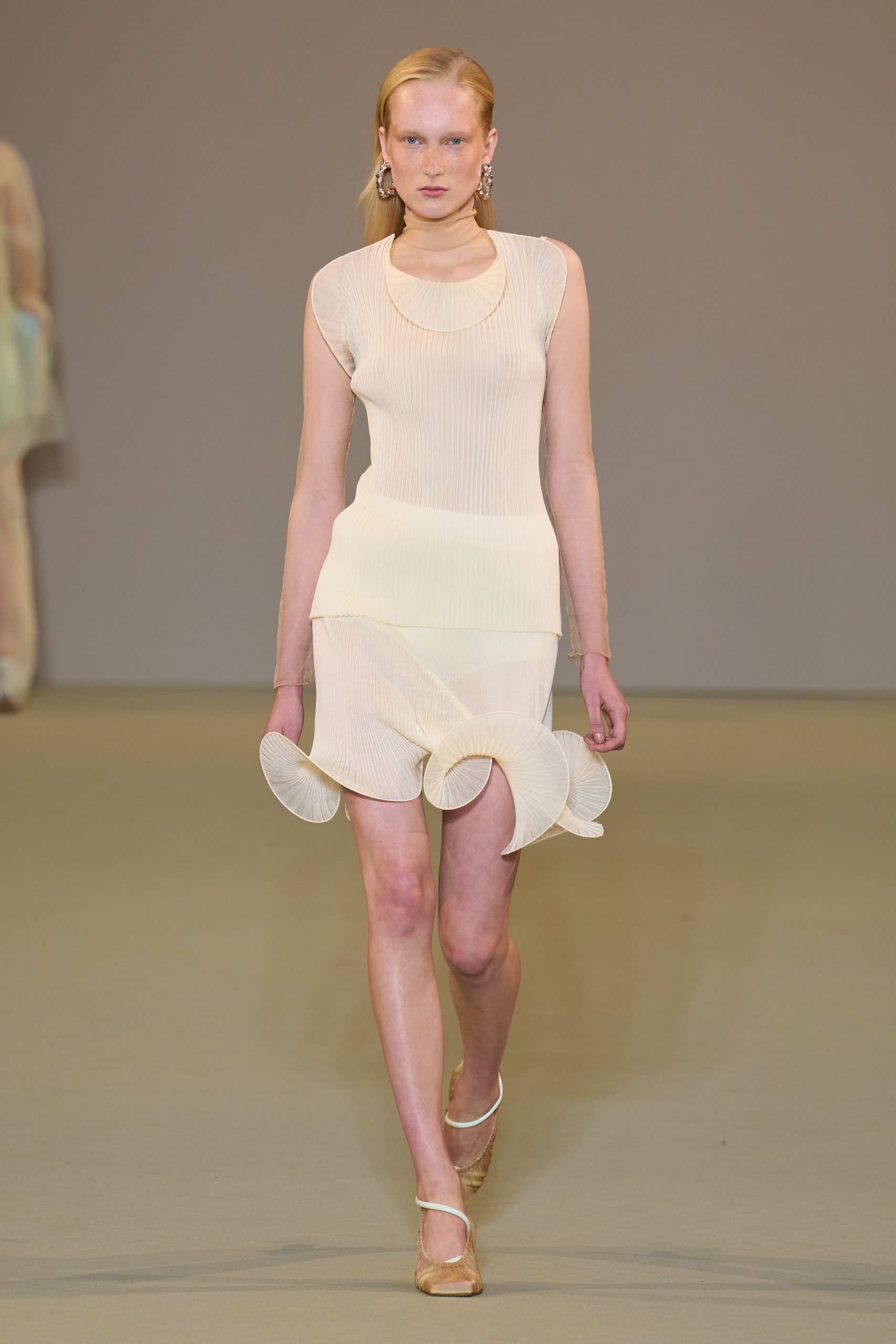 beige fitted sleeveless mini dress