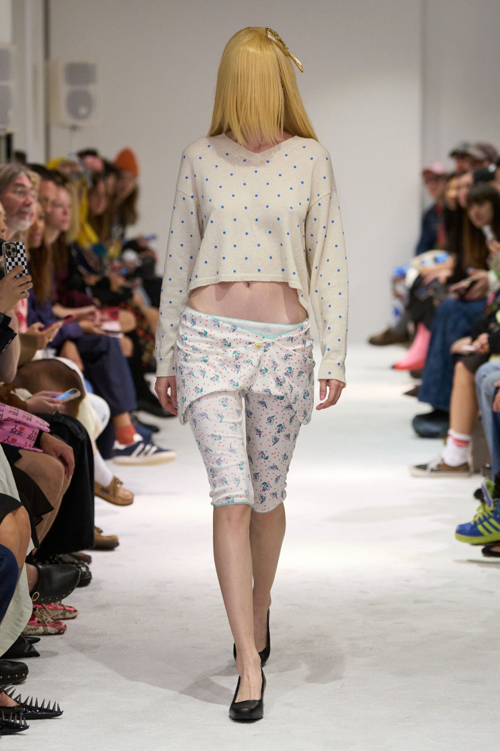 cropped white polka-dot top with floral shorts