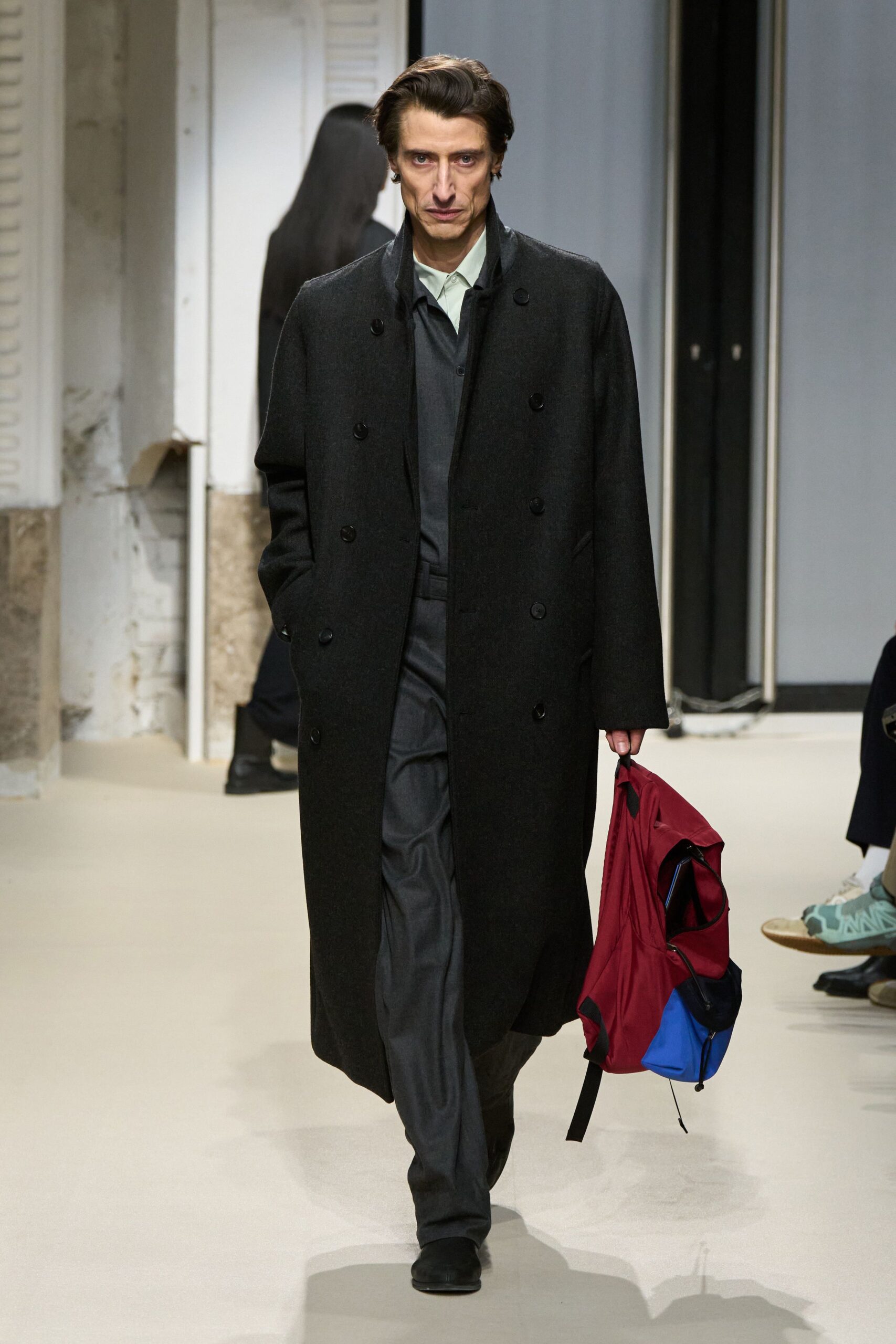 black wool coat with gray pants