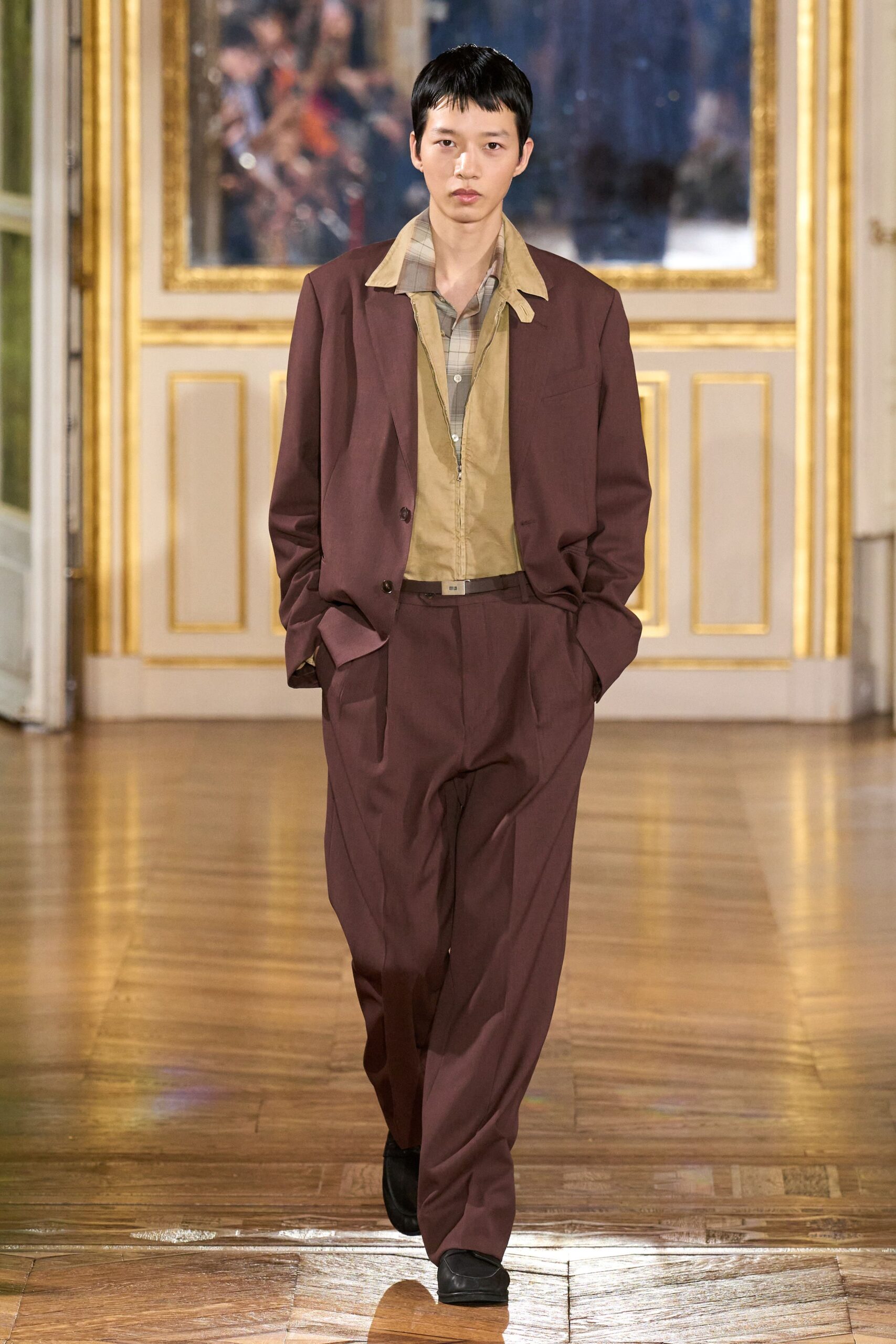 brown relaxed suit with beige shirt