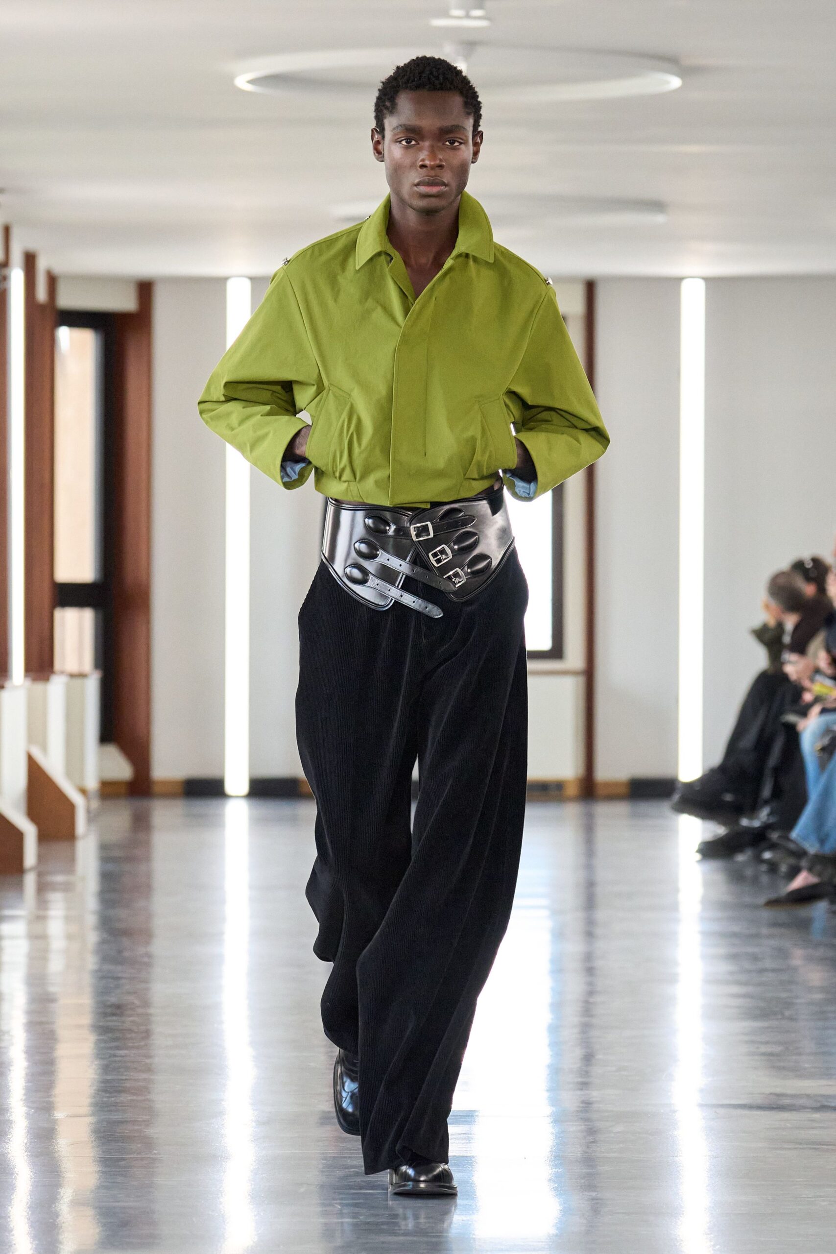 green relaxed shirt with black pants