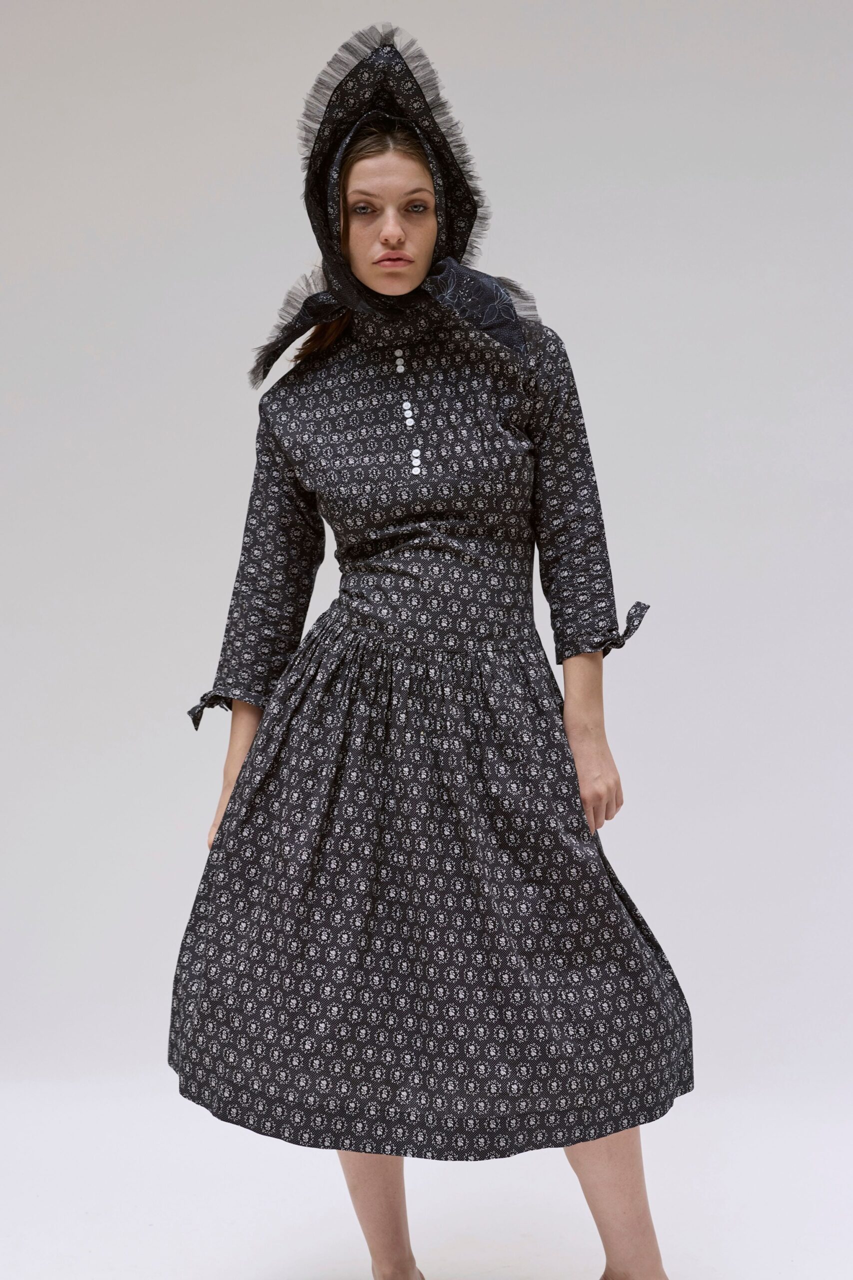 black and white printed midi dress with headscarf