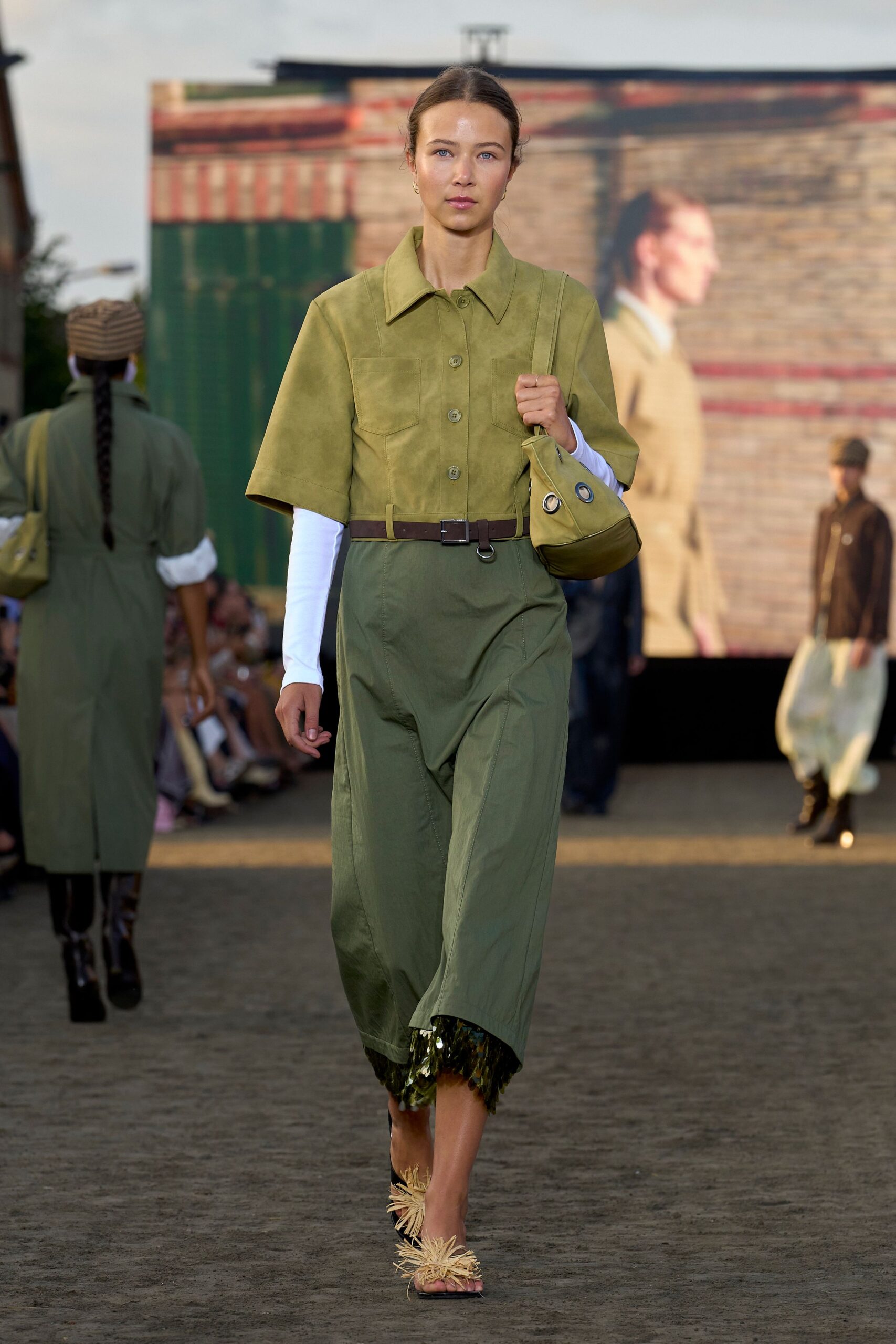 green suede short-sleeve collared structured buttoned pockets shirt