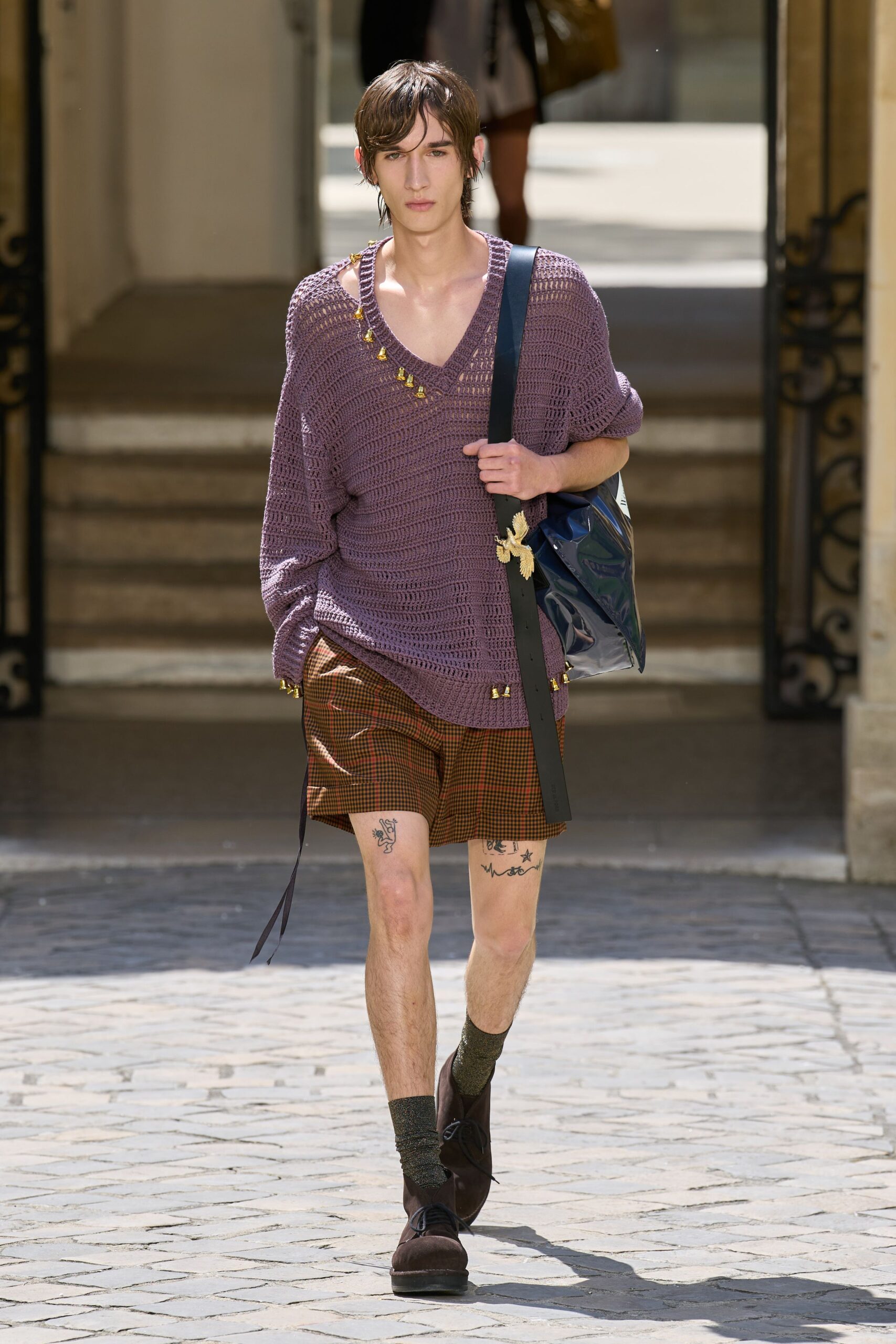 purple relaxed sweater with brown shorts