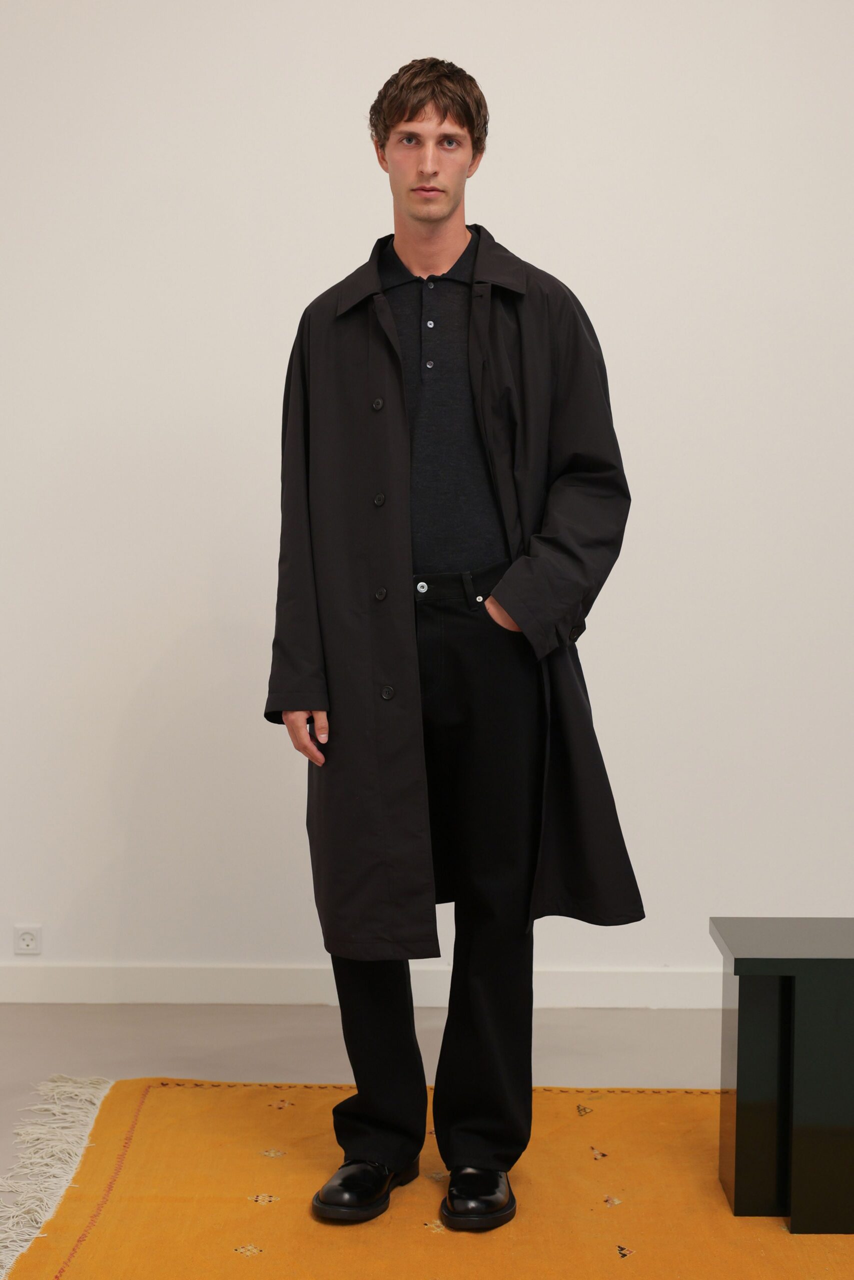 black cotton long-sleeve collared oversized buttoned straight-leg coat