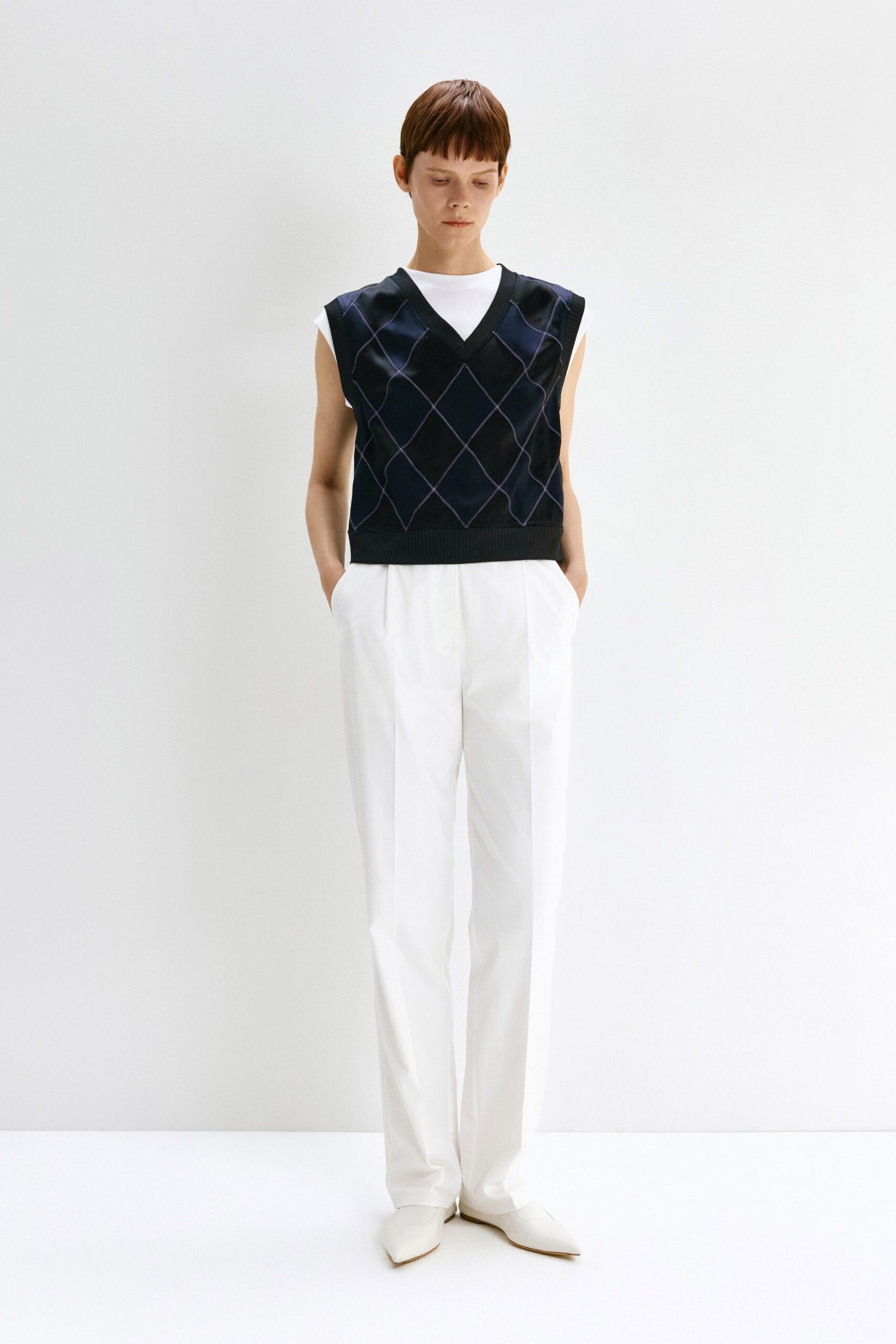 black vest white t-shirt pants