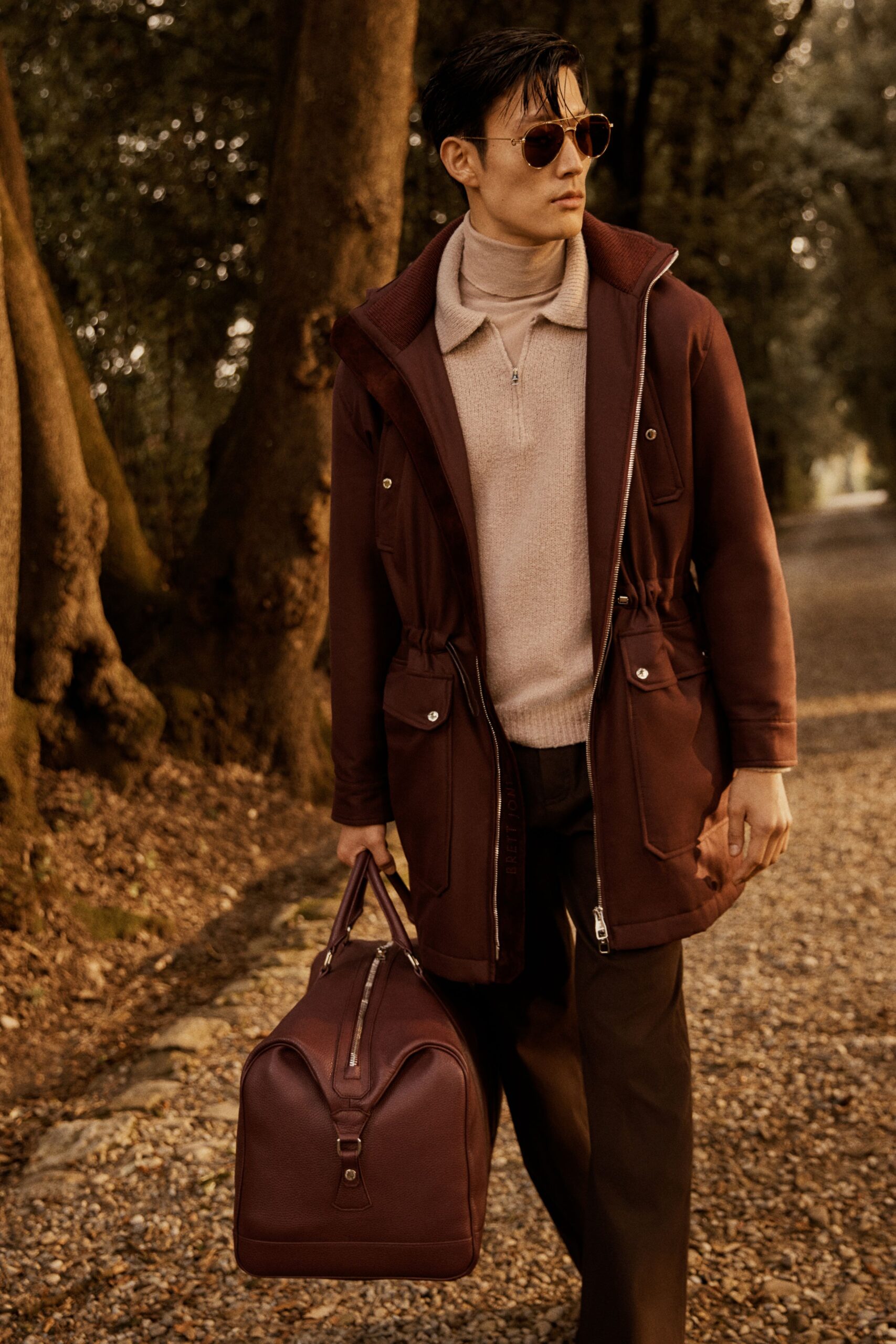 brown parka beige sweater black pants