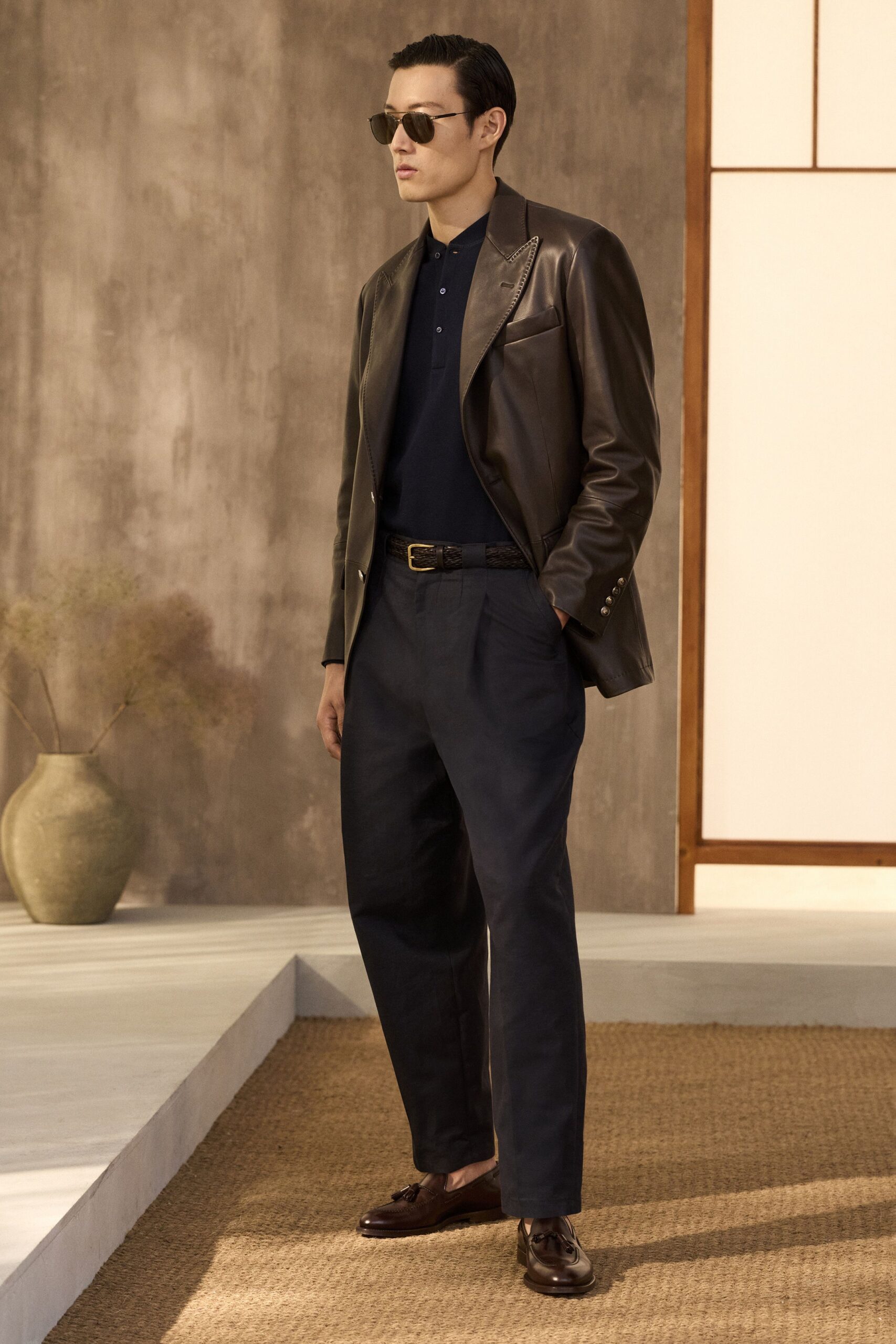 brown leather long-sleeve collared structured pockets shiny jacket
