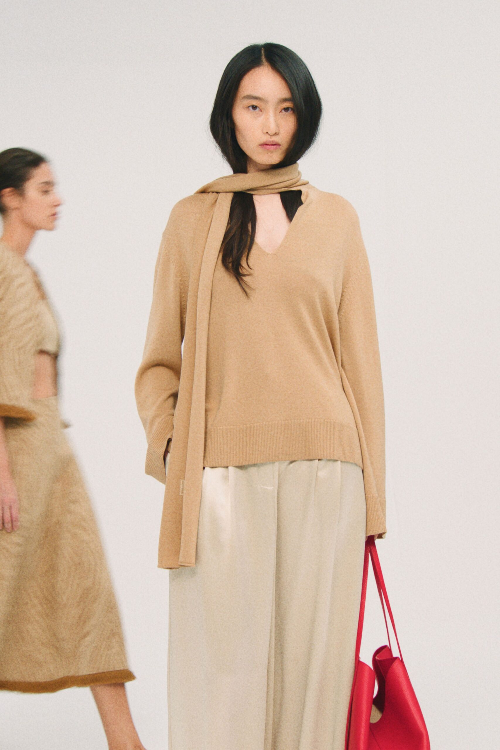 beige wool relaxed sweater with cream pants