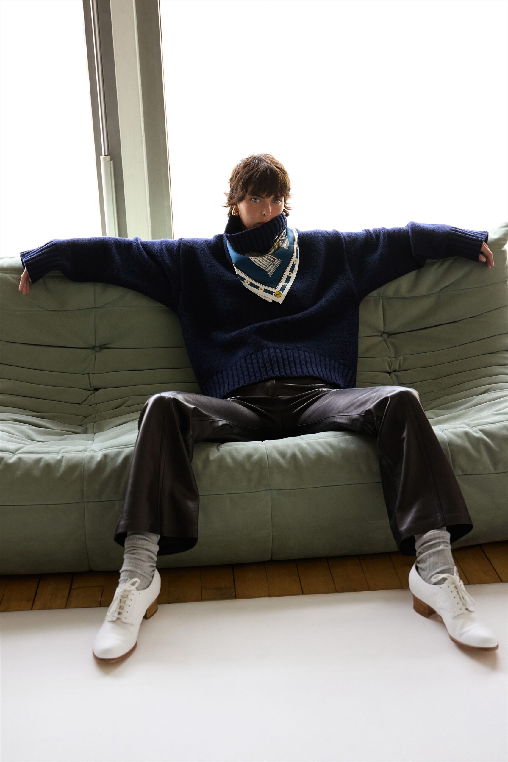 navy wool relaxed sweater with black leather pants